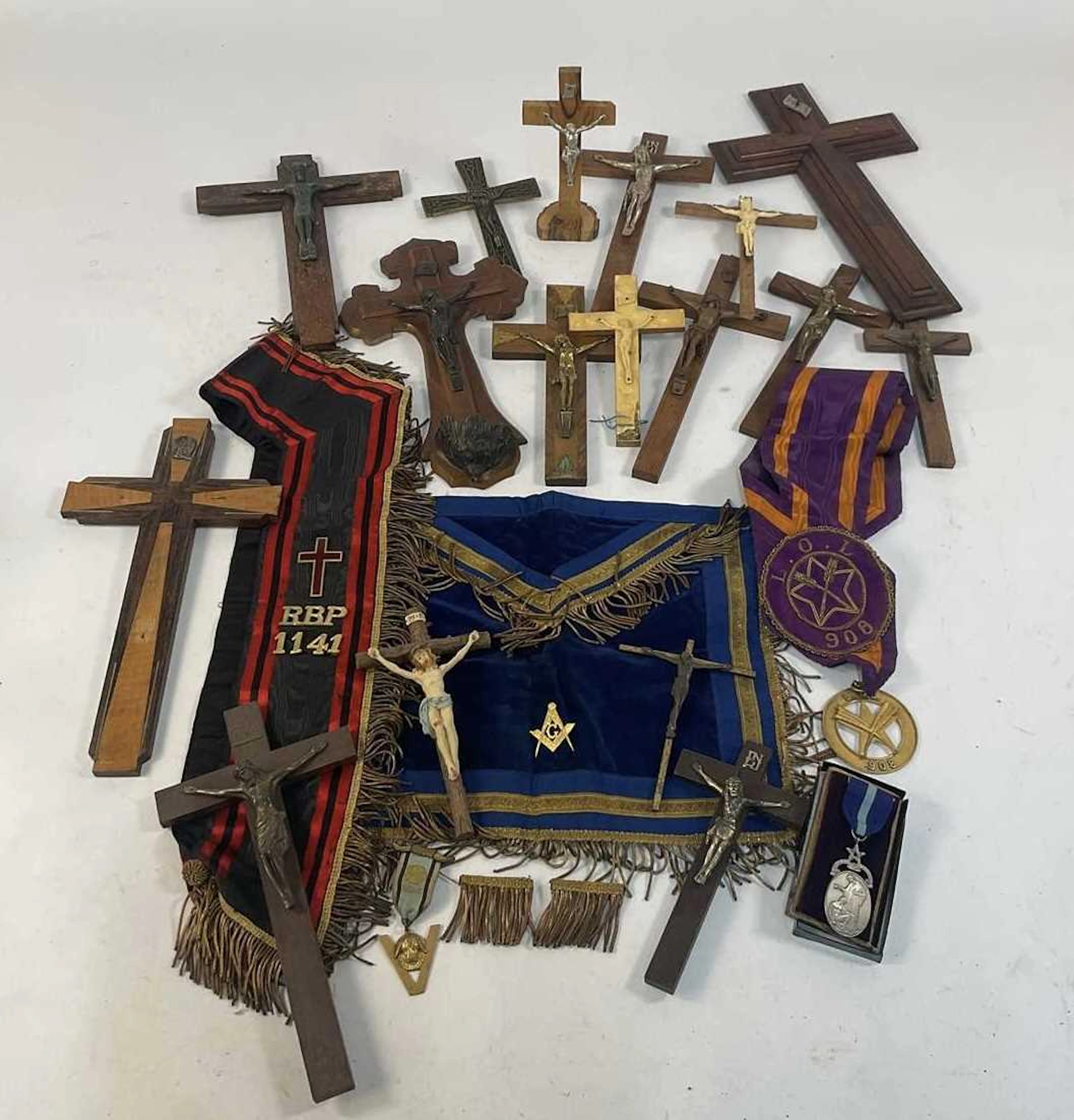 A quantity of Masonic and religious crucifixes