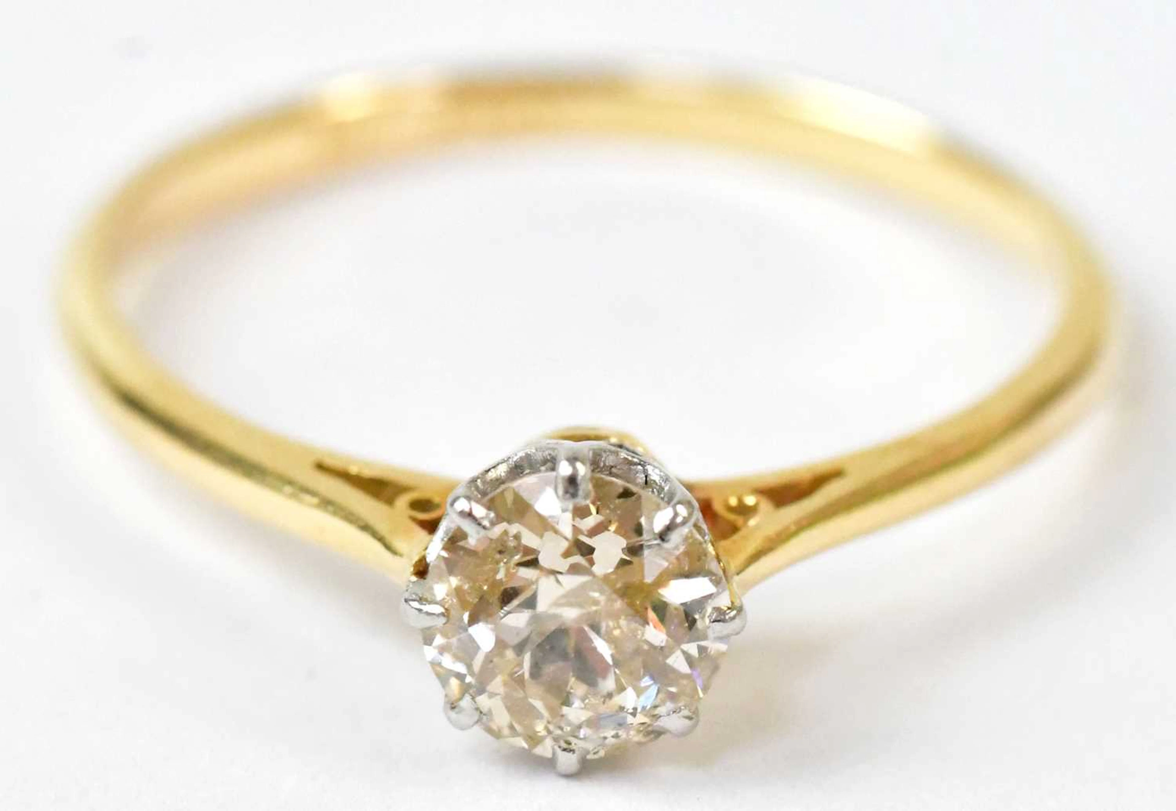An 18ct yellow gold and diamond solitaire ring