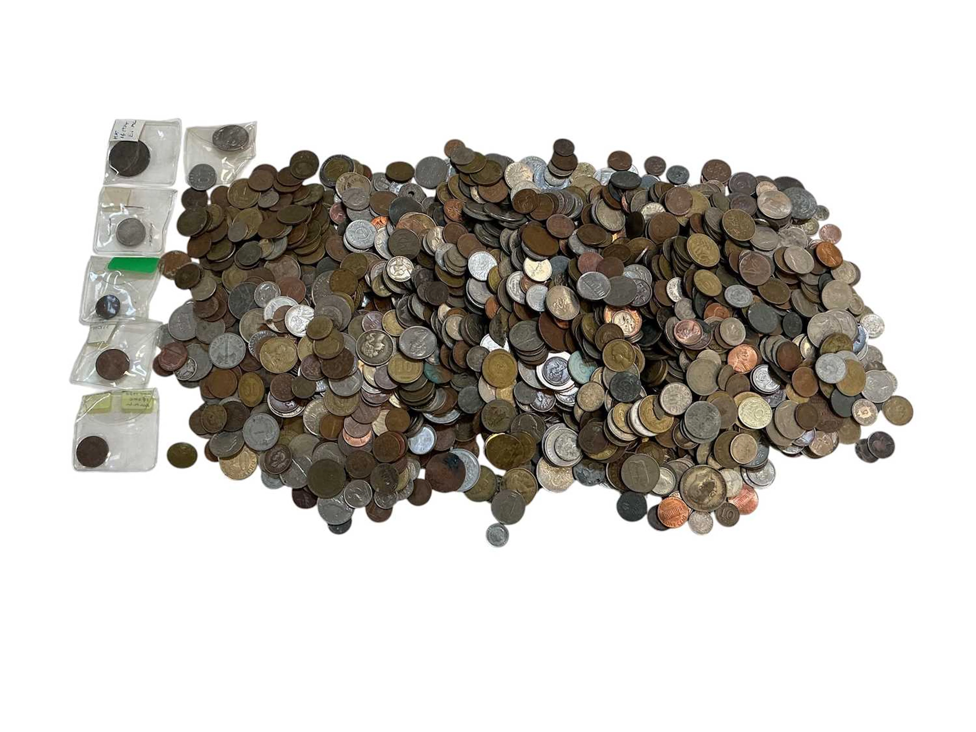 An assortment of all world coins including American
