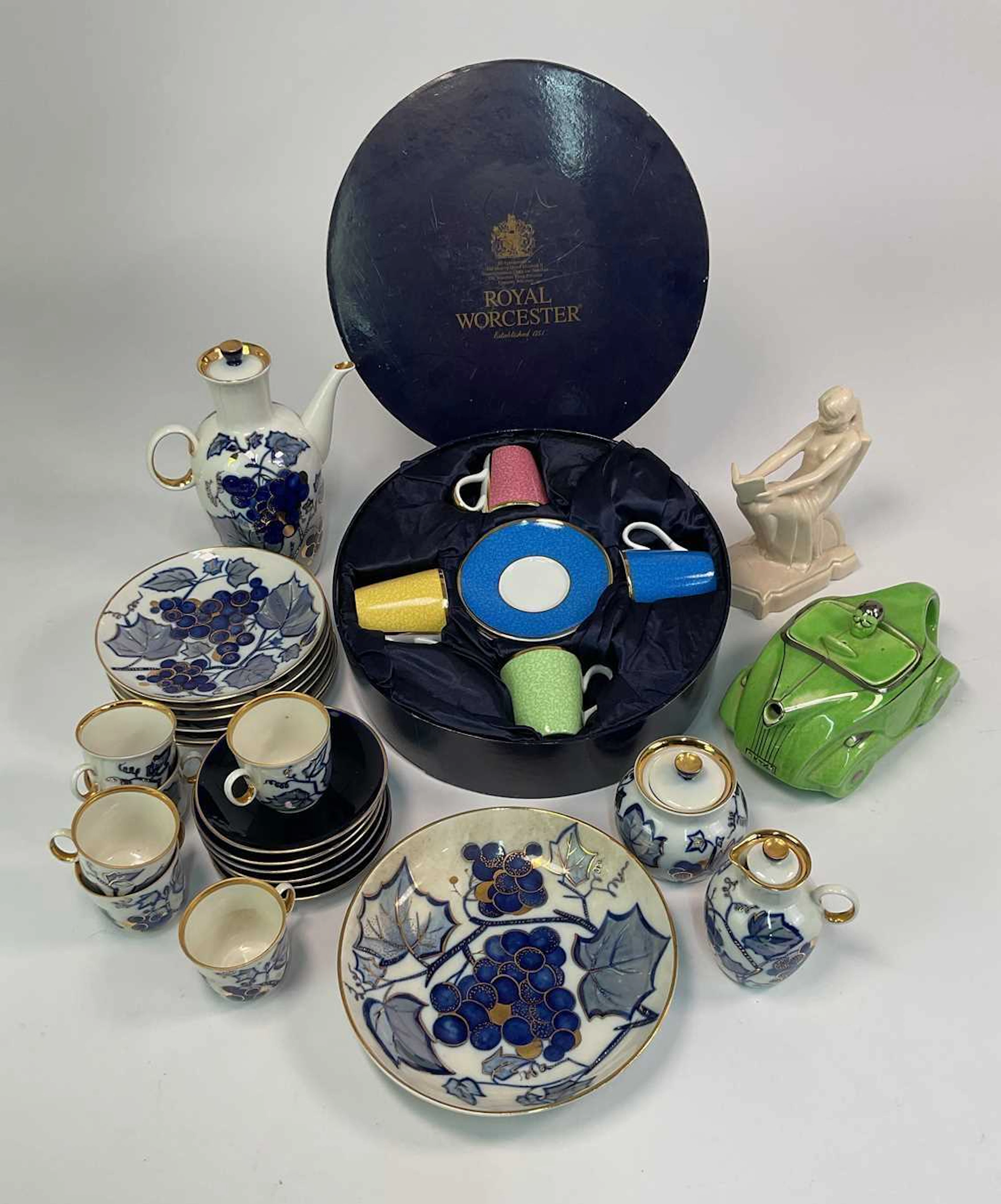 ROYAL WORCESTER; a coffee set together with a Russian made coffee set