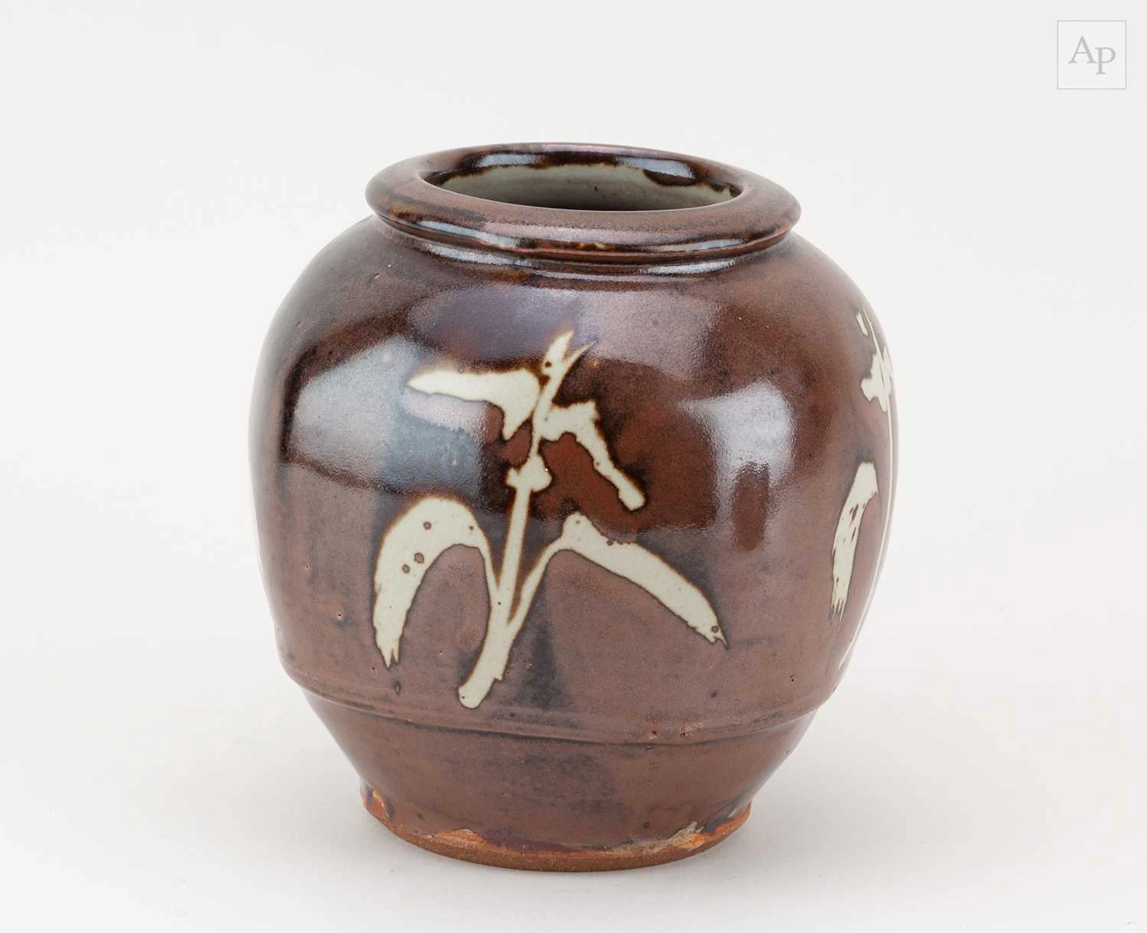MIKE DODD (born 1943); a stoneware jar covered in kaki...