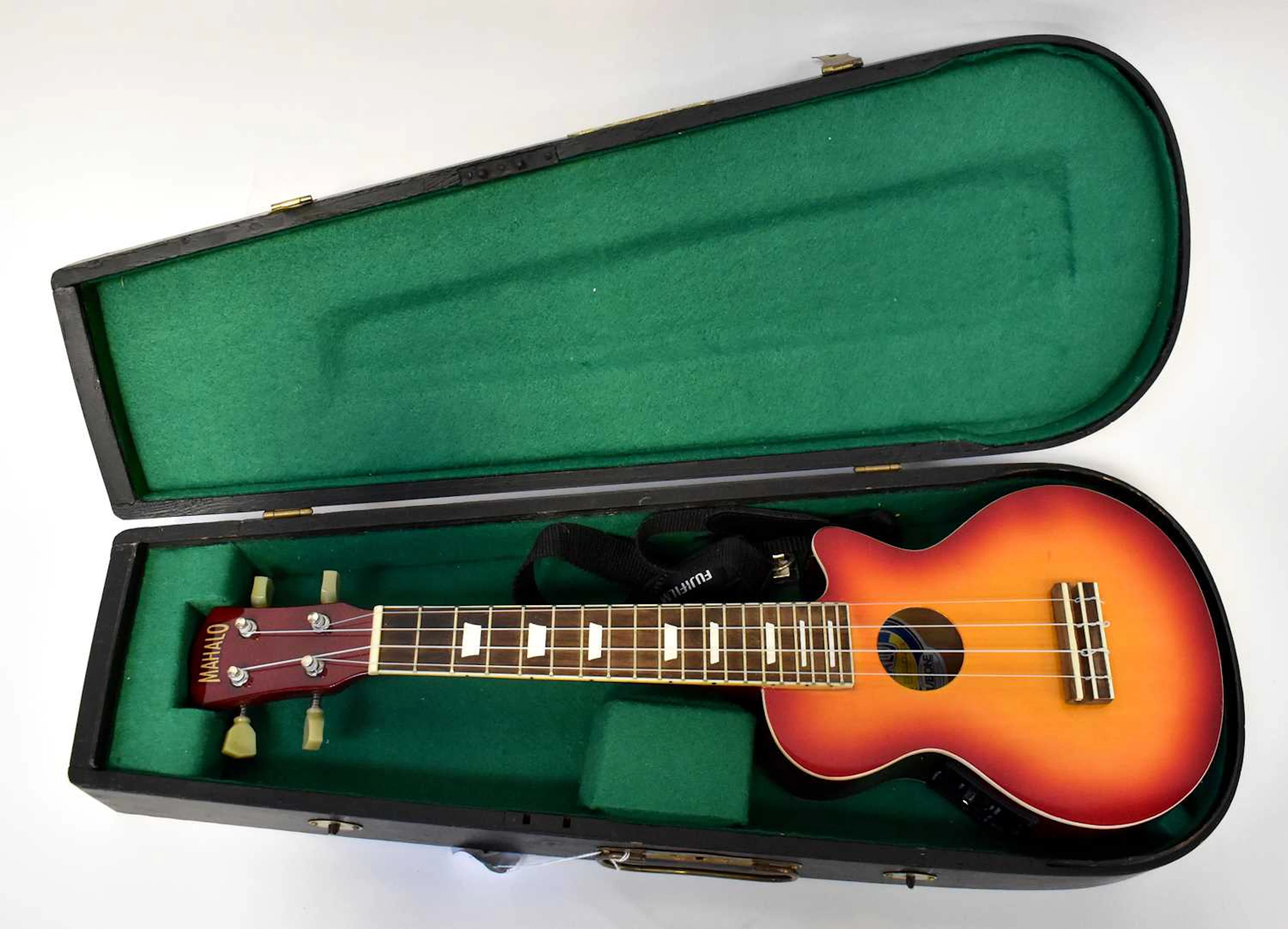 MAHALO; a ukelele in a fitted case
