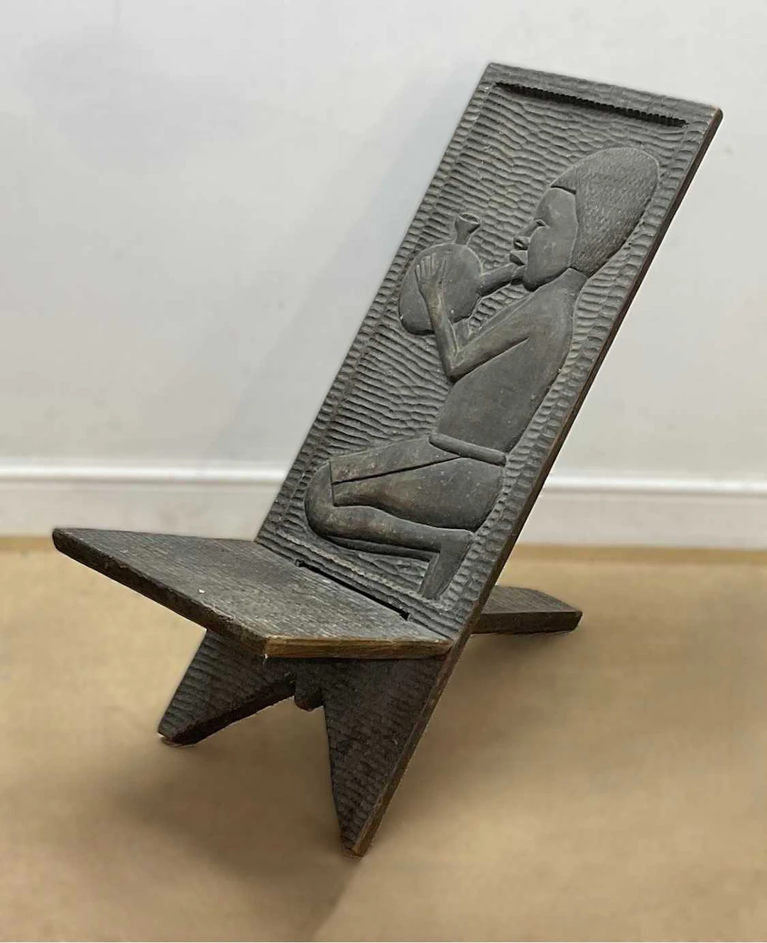 A carved African hardwood interlocking Senufo chair