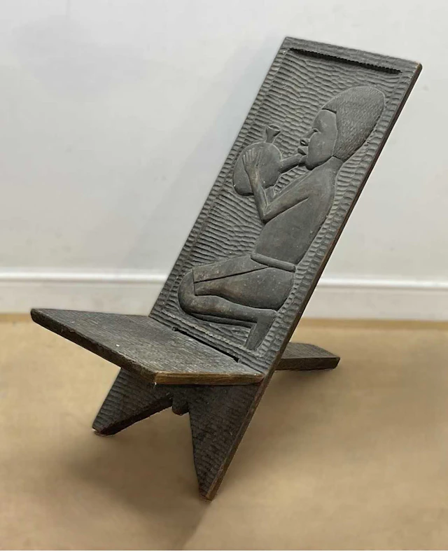 A carved African hardwood interlocking Senufo chair