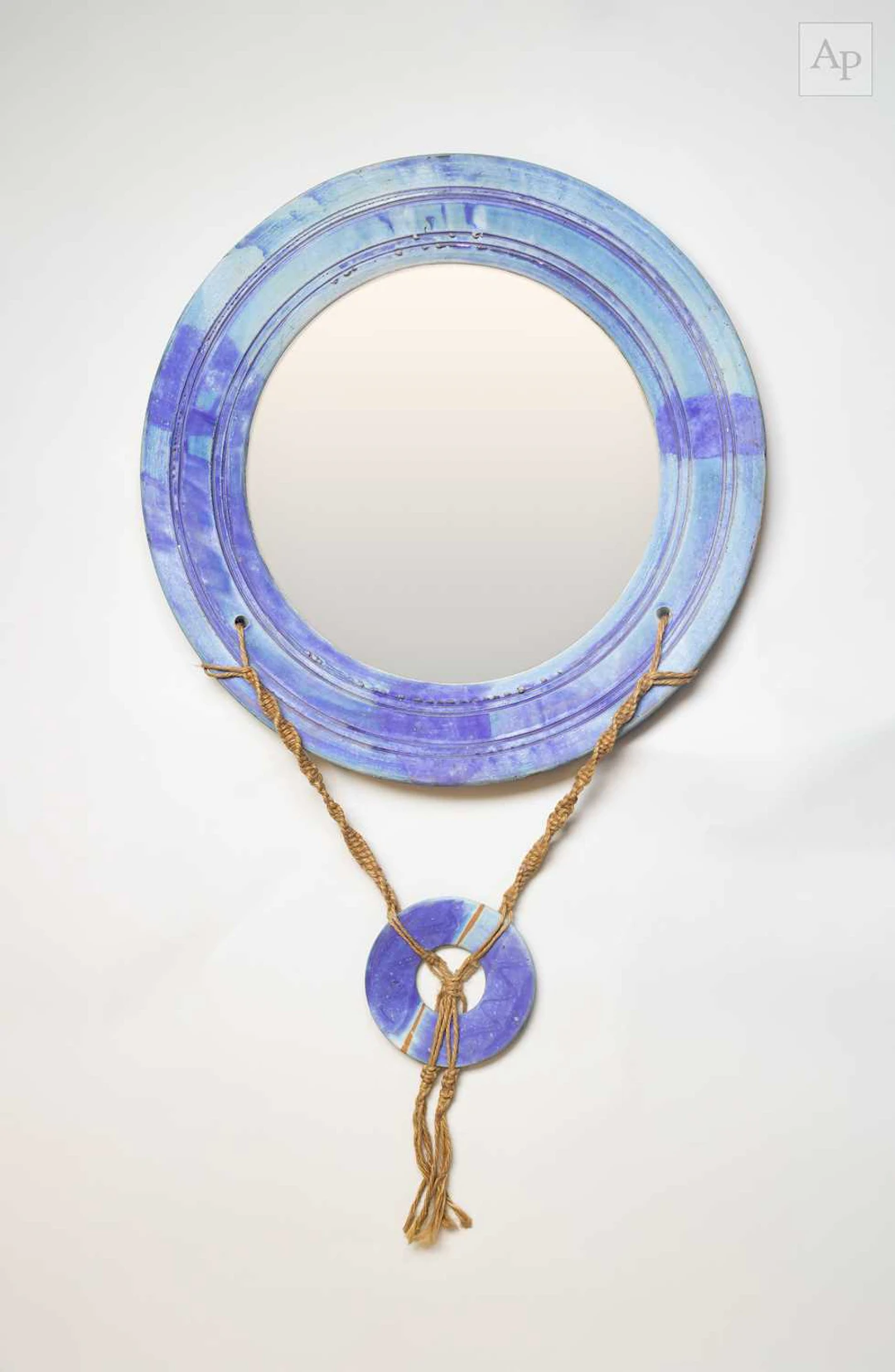 SIMON SHAW (born 1961); a large stoneware mirror covered...