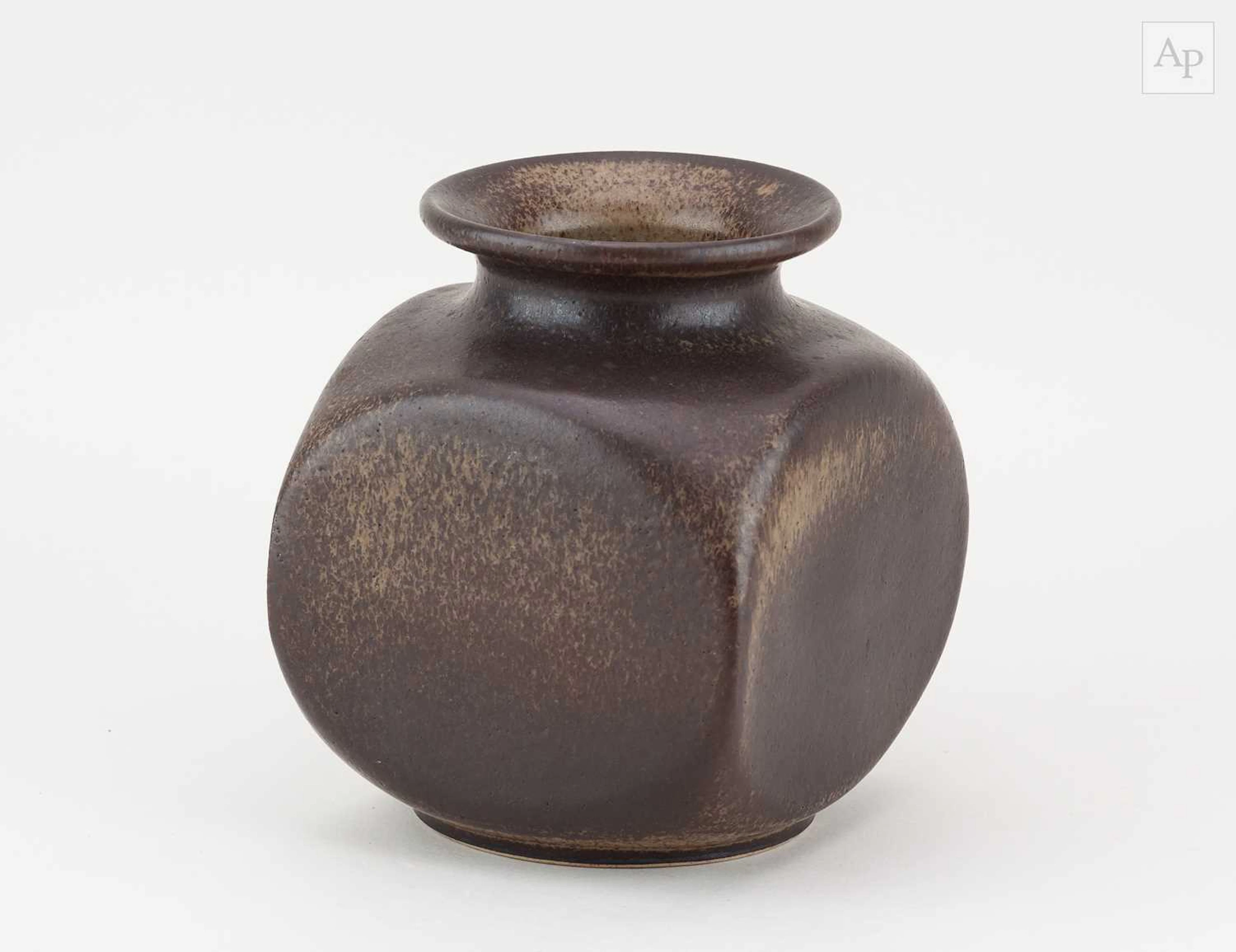DEREK THORNTON; a squared off stoneware bottle covered in...