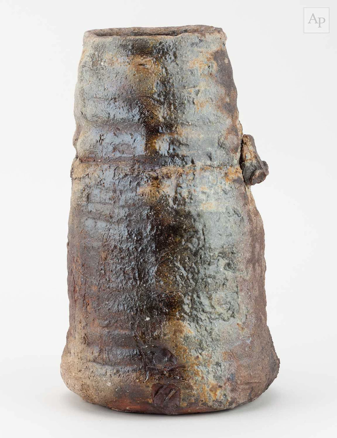 CHARLES BOUND (born 1939); a faceted wood fired stoneware...