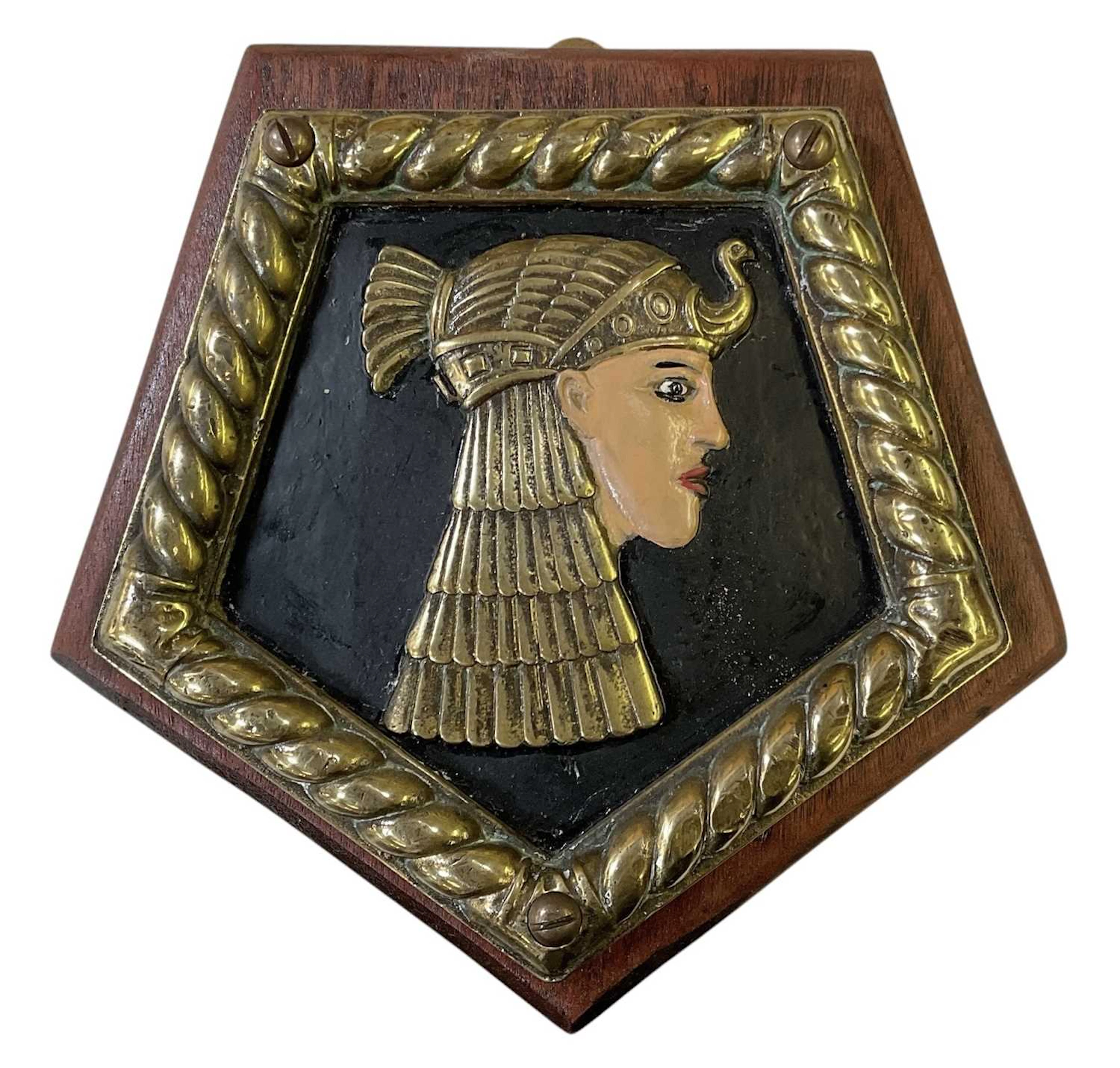 An early 20th century painted brass ship's badge/name plaque for 'HMS Cleopatra'