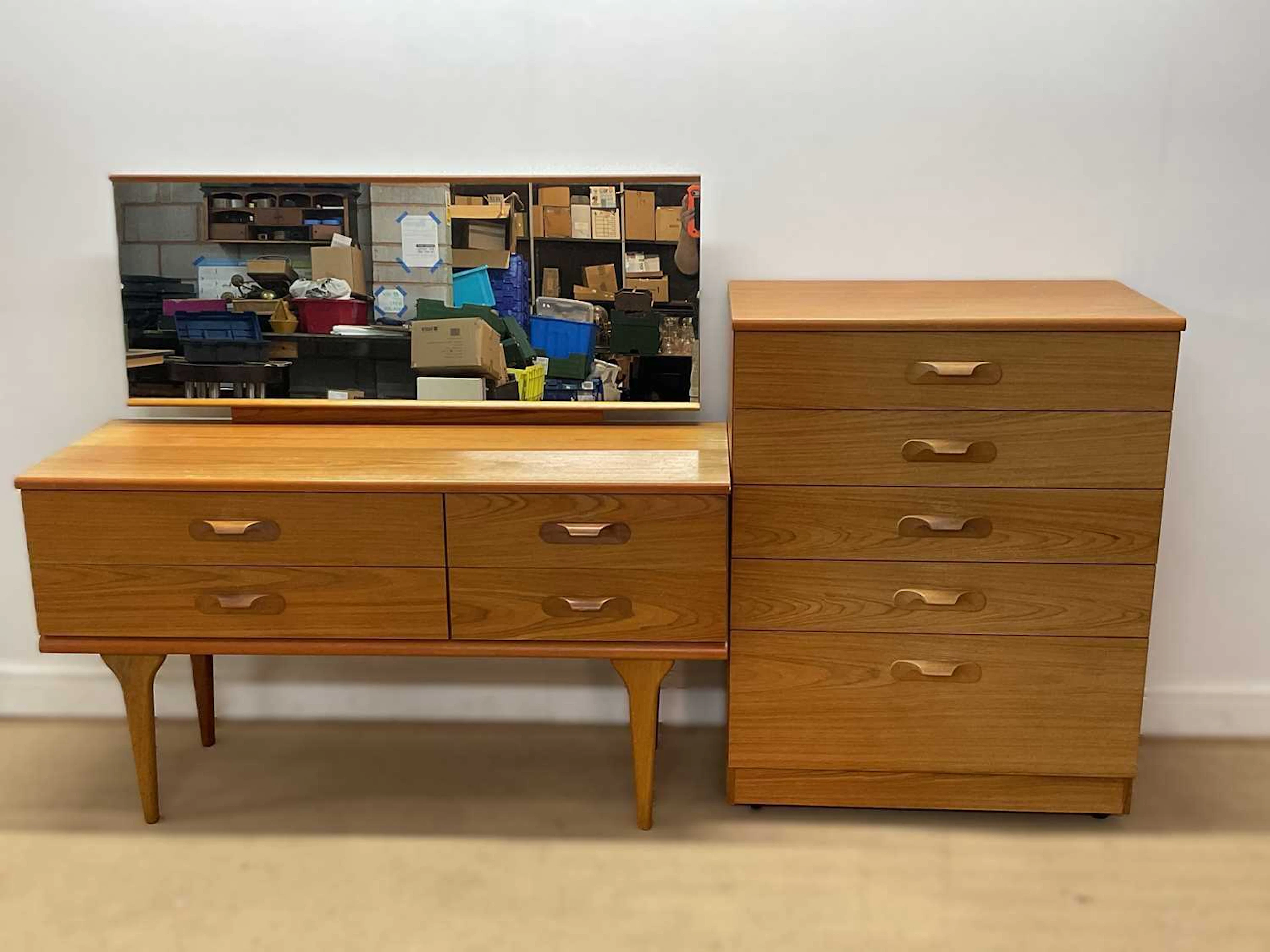 AUSTIN SUITE; a teak five drawer tallboy