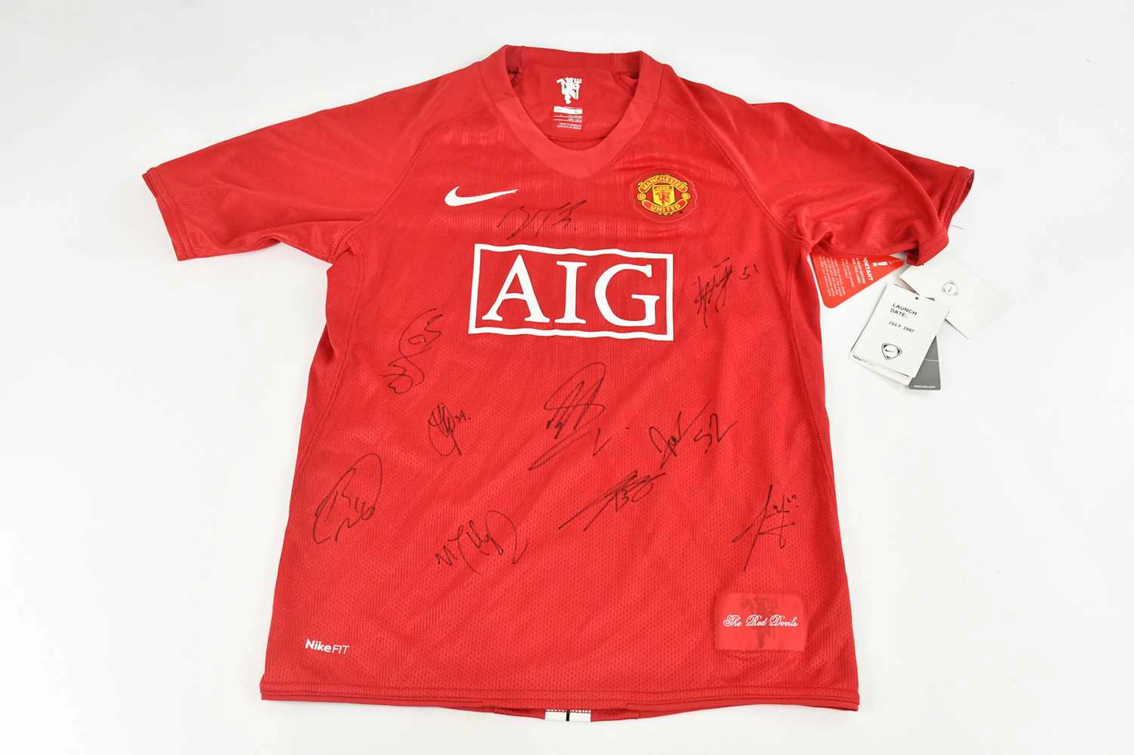 An autographed replica Manchester United children's jersey