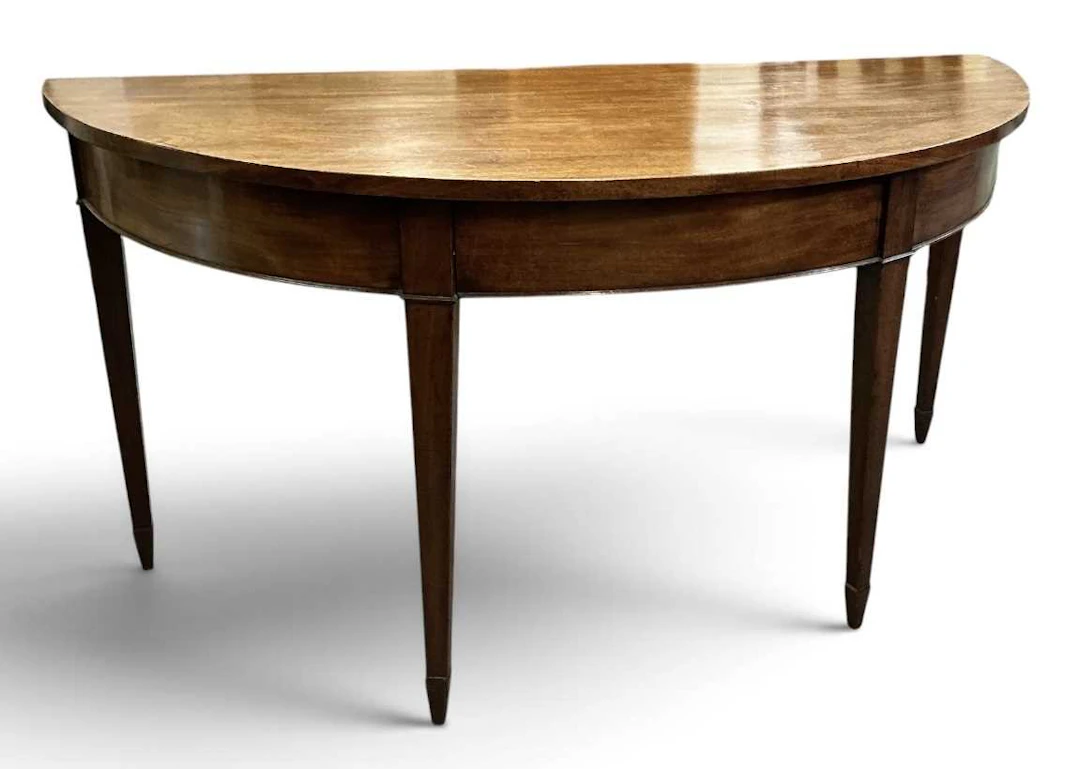 A 19th century mahogany demi-lune bowfront hall table