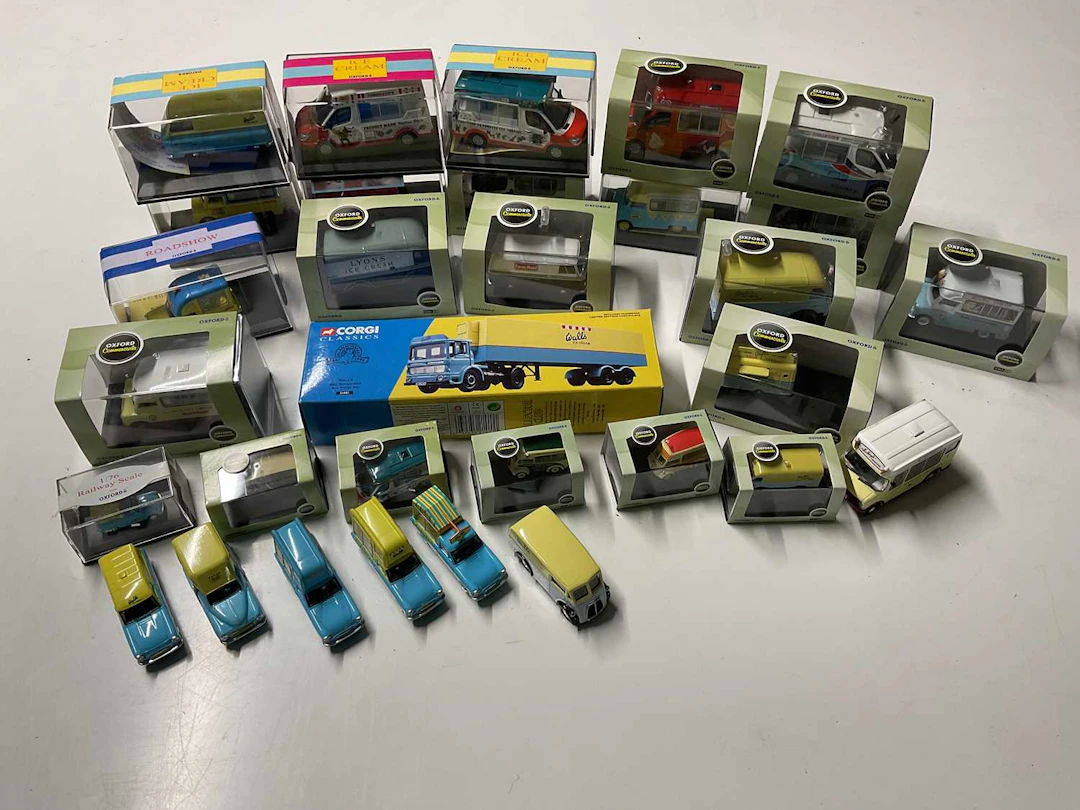 A quantity of diecast ice cream vans