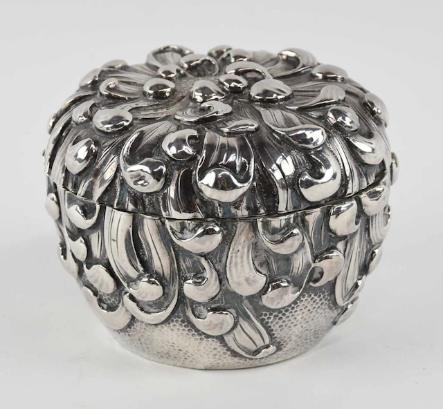 A Chinese Export silver circular lidded pot