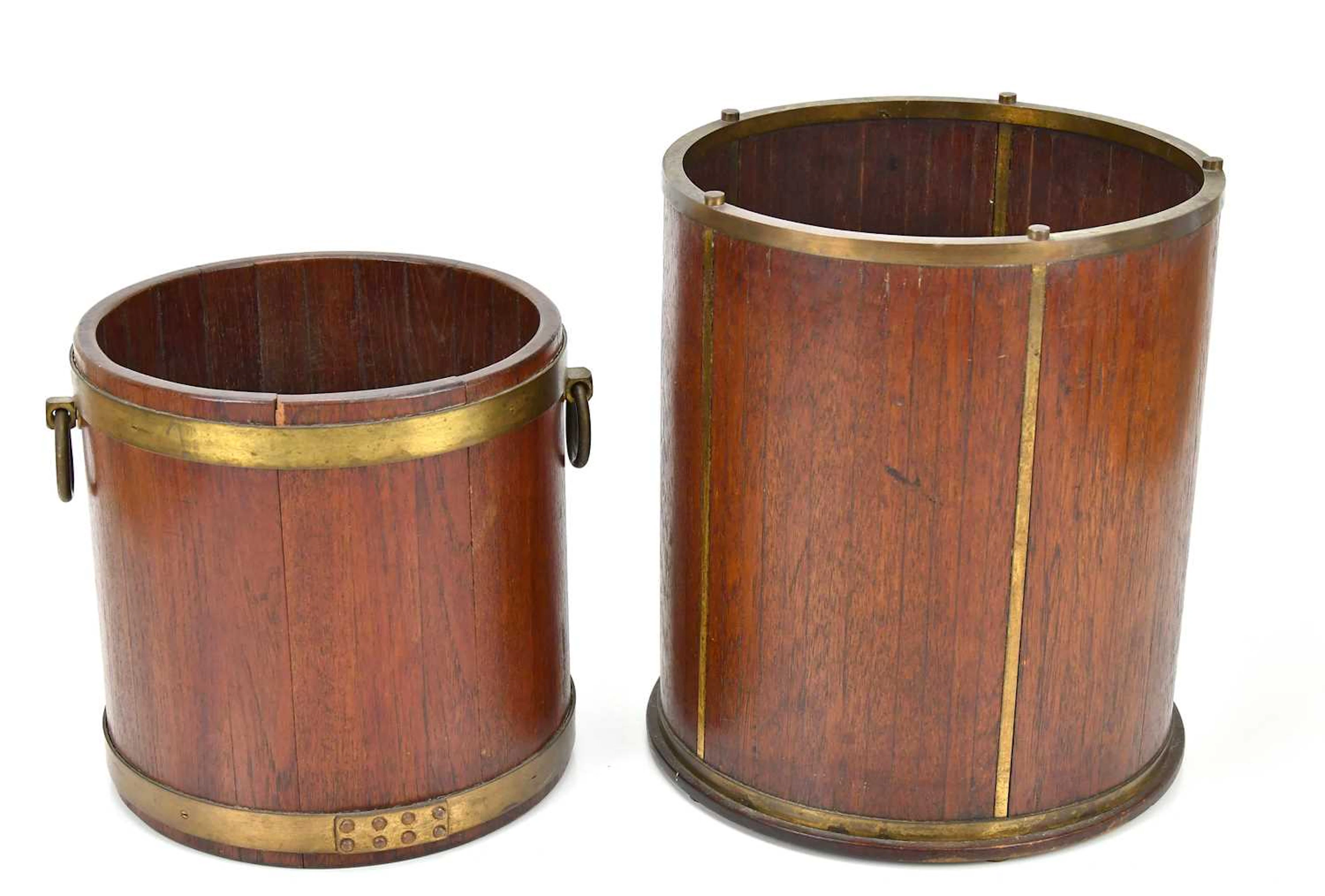 A mahogany and brass bound jardiniere bucket
