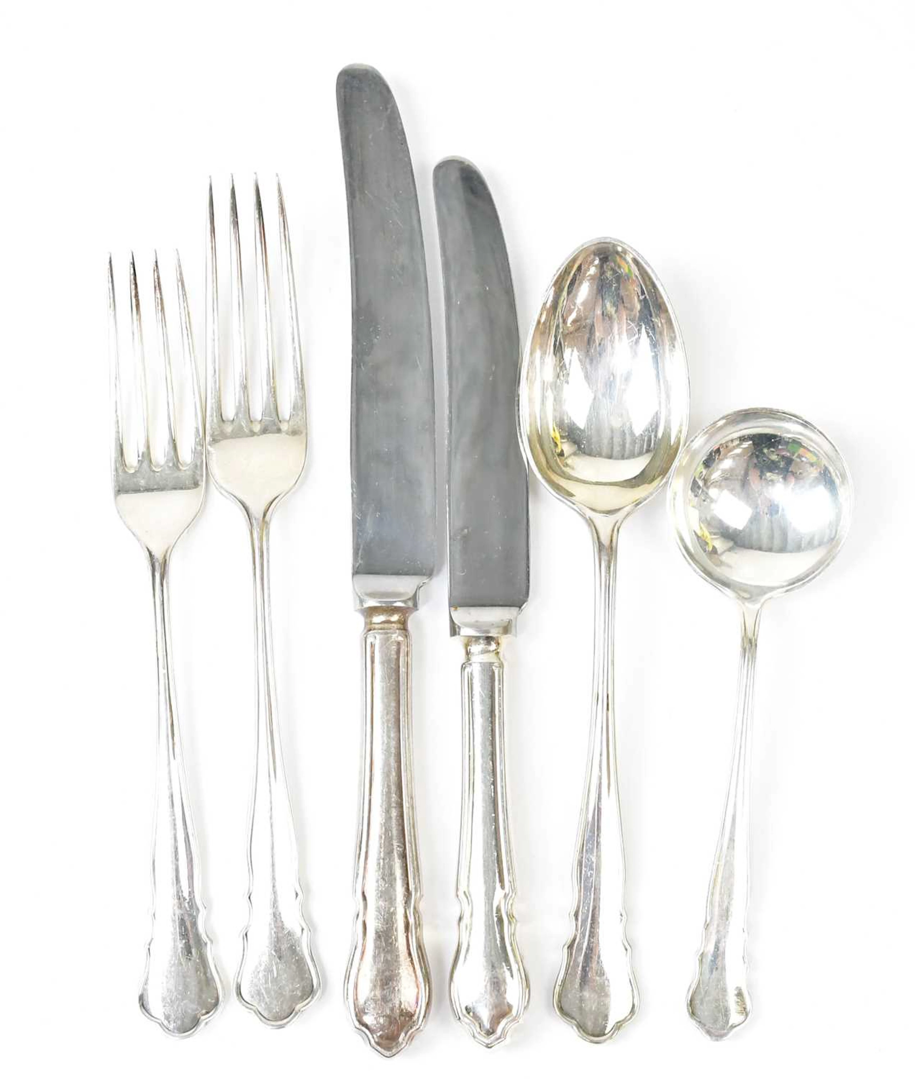 A collection of silver-plated flatware