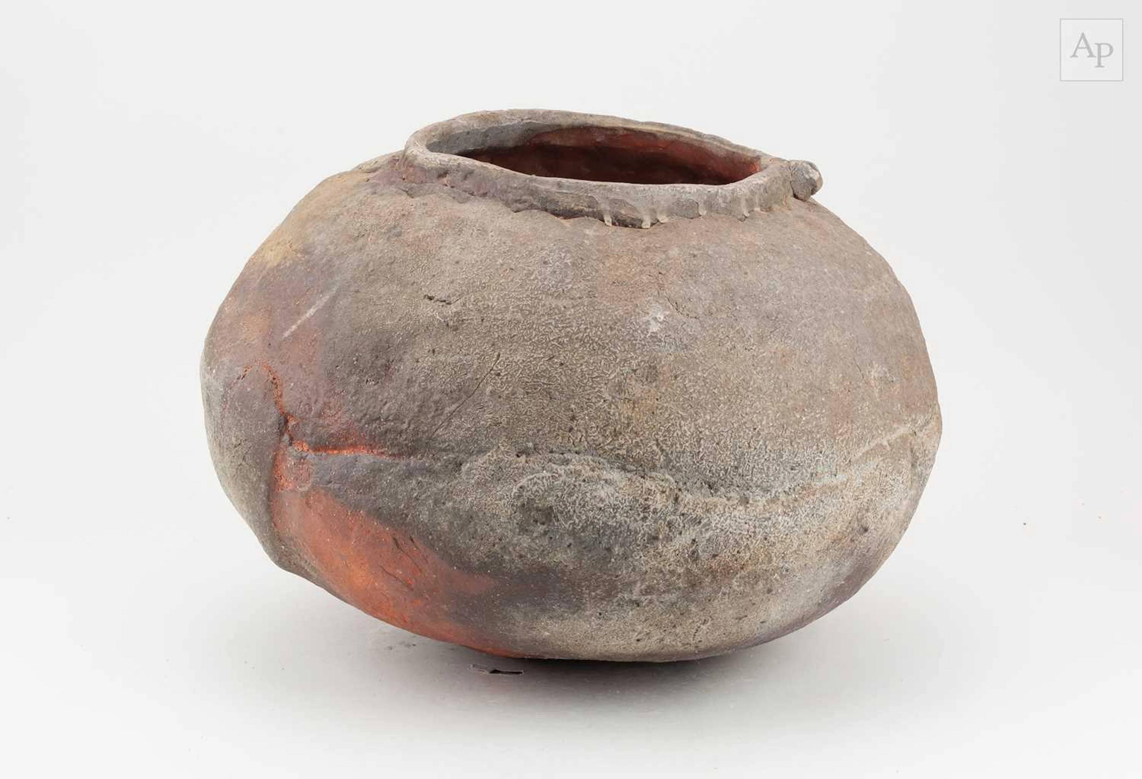 CHARLES BOUND (born 1939); a squat wood fired stoneware jar covered in ash glaze