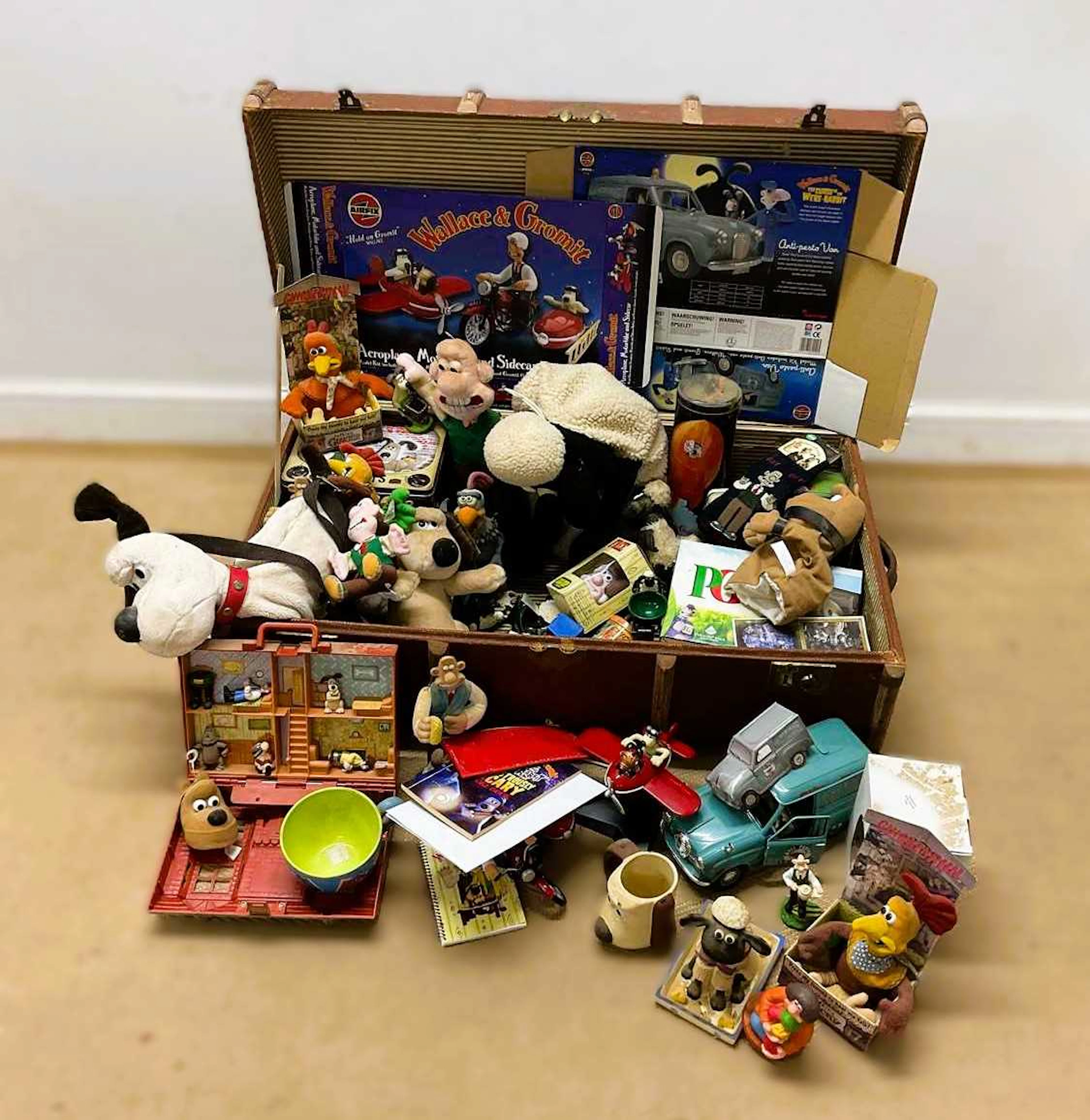 AARDMAN ANIMATION; a large vintage travel trunk...