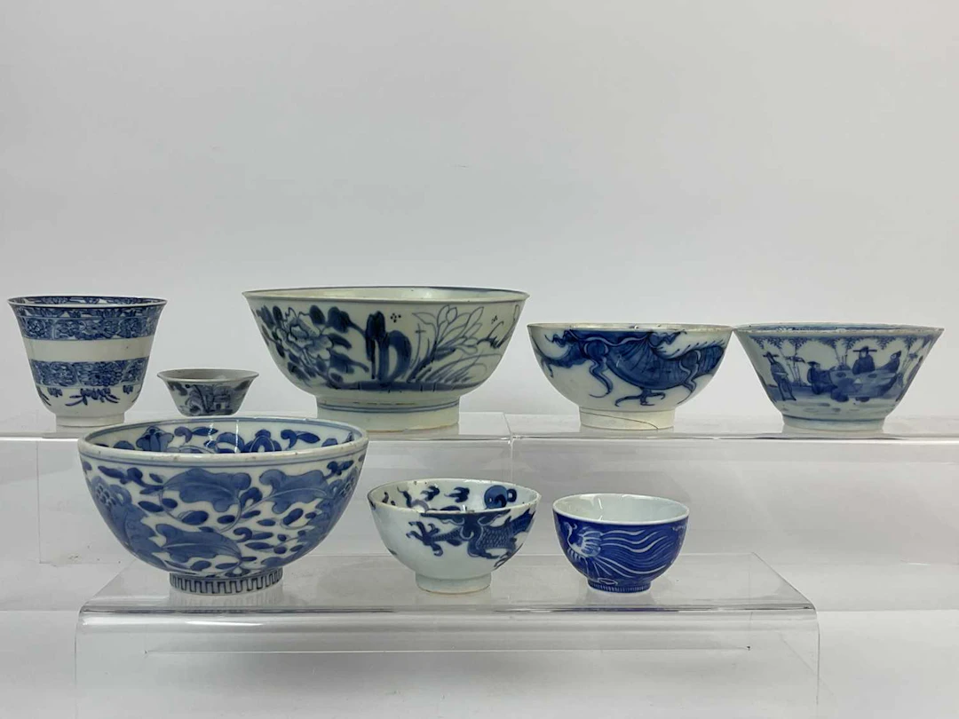 Eight Chinese blue and white porcelain bowls of various sizes