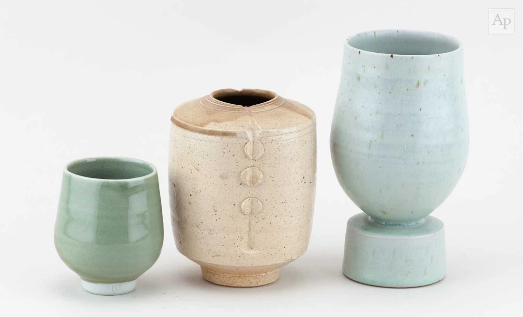ARTHUR GRIFFITHS (1928-2016); a stoneware vessel on a...