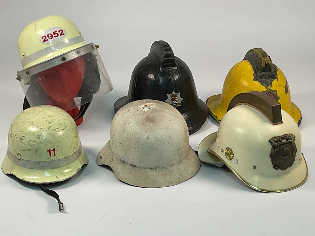 Six fireman helmets