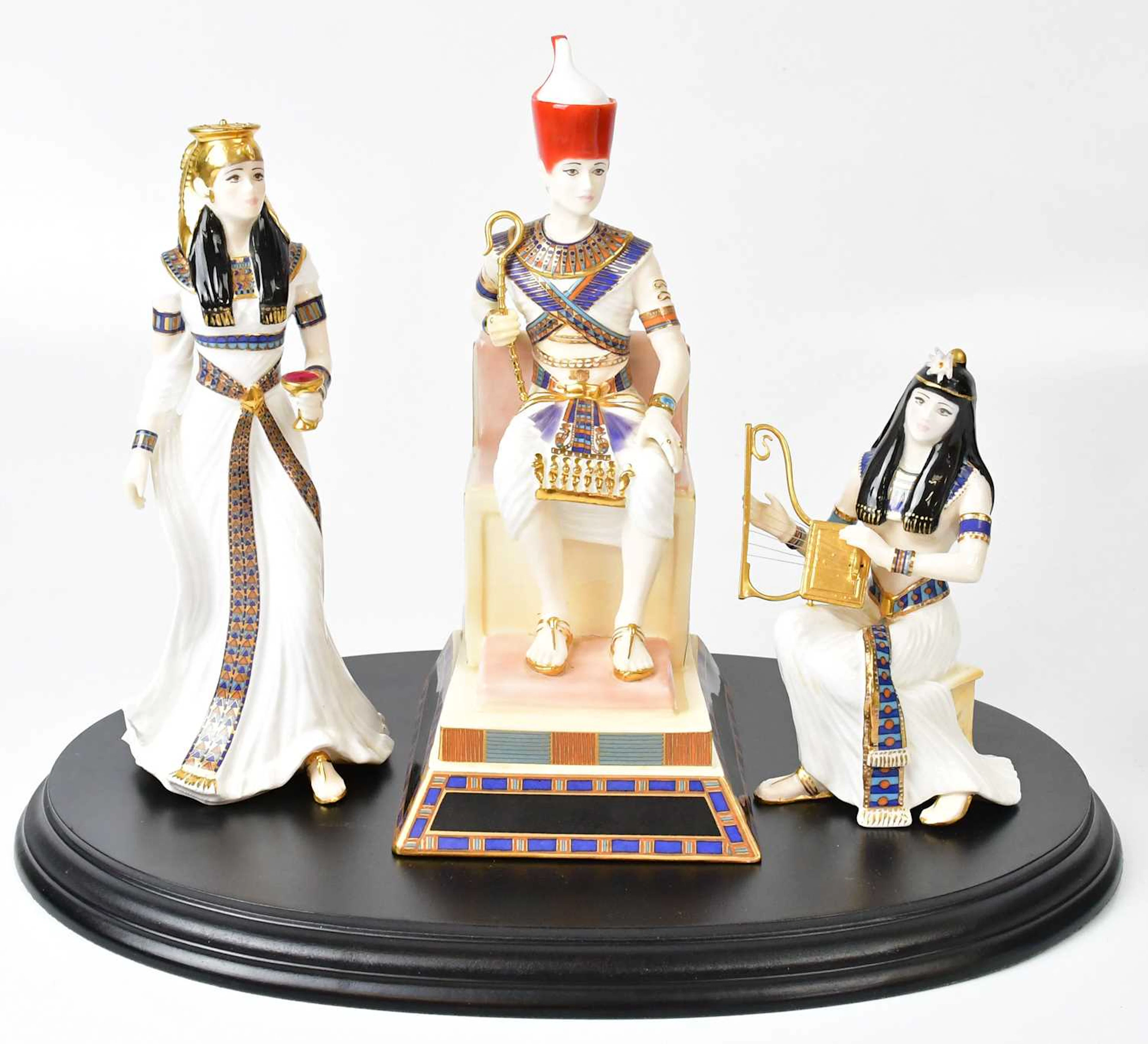 ROYAL WORCESTER FOR COMPTON & WOODHOUSE; three figures
