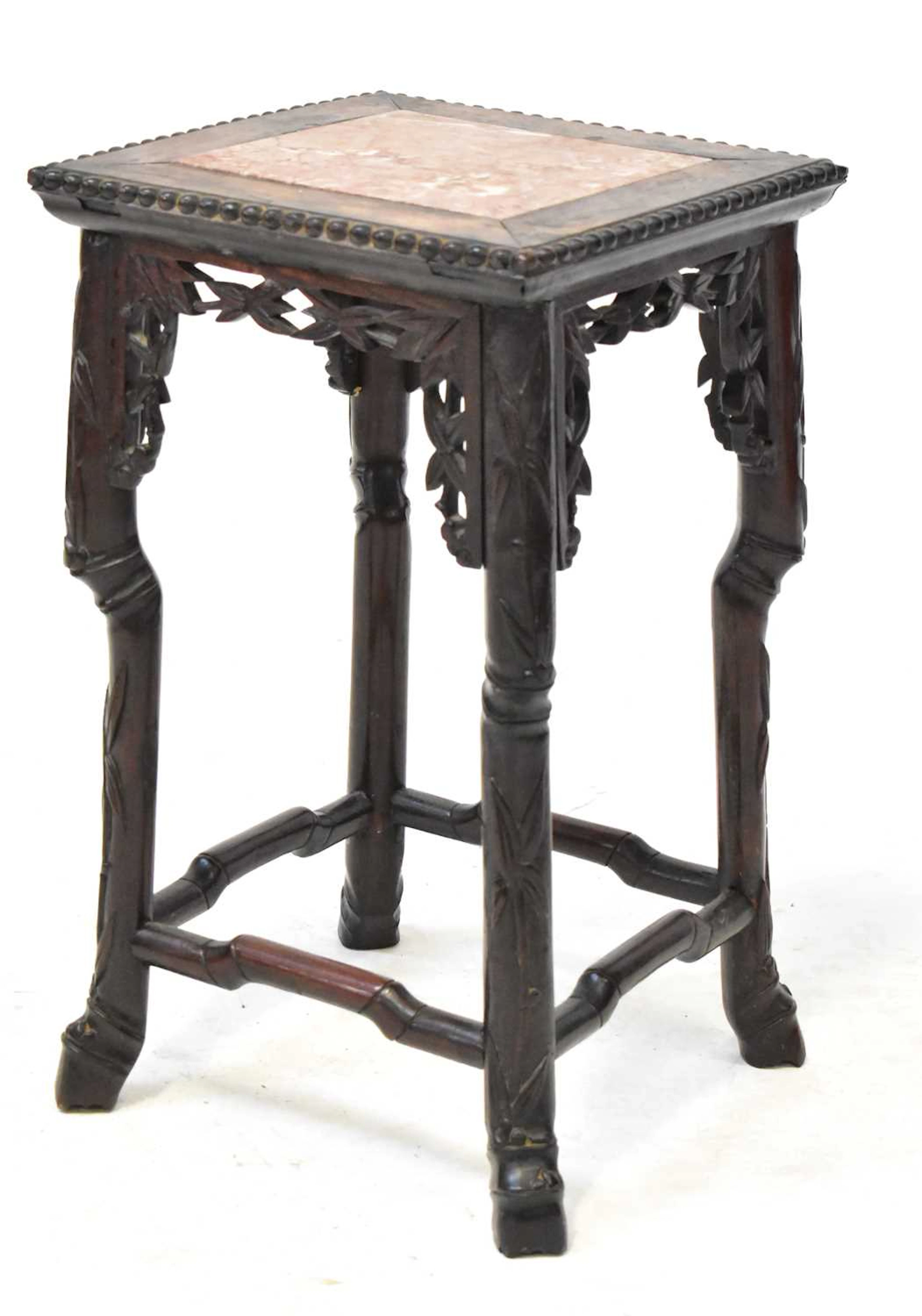 A Chinese rosewood jardinière stand