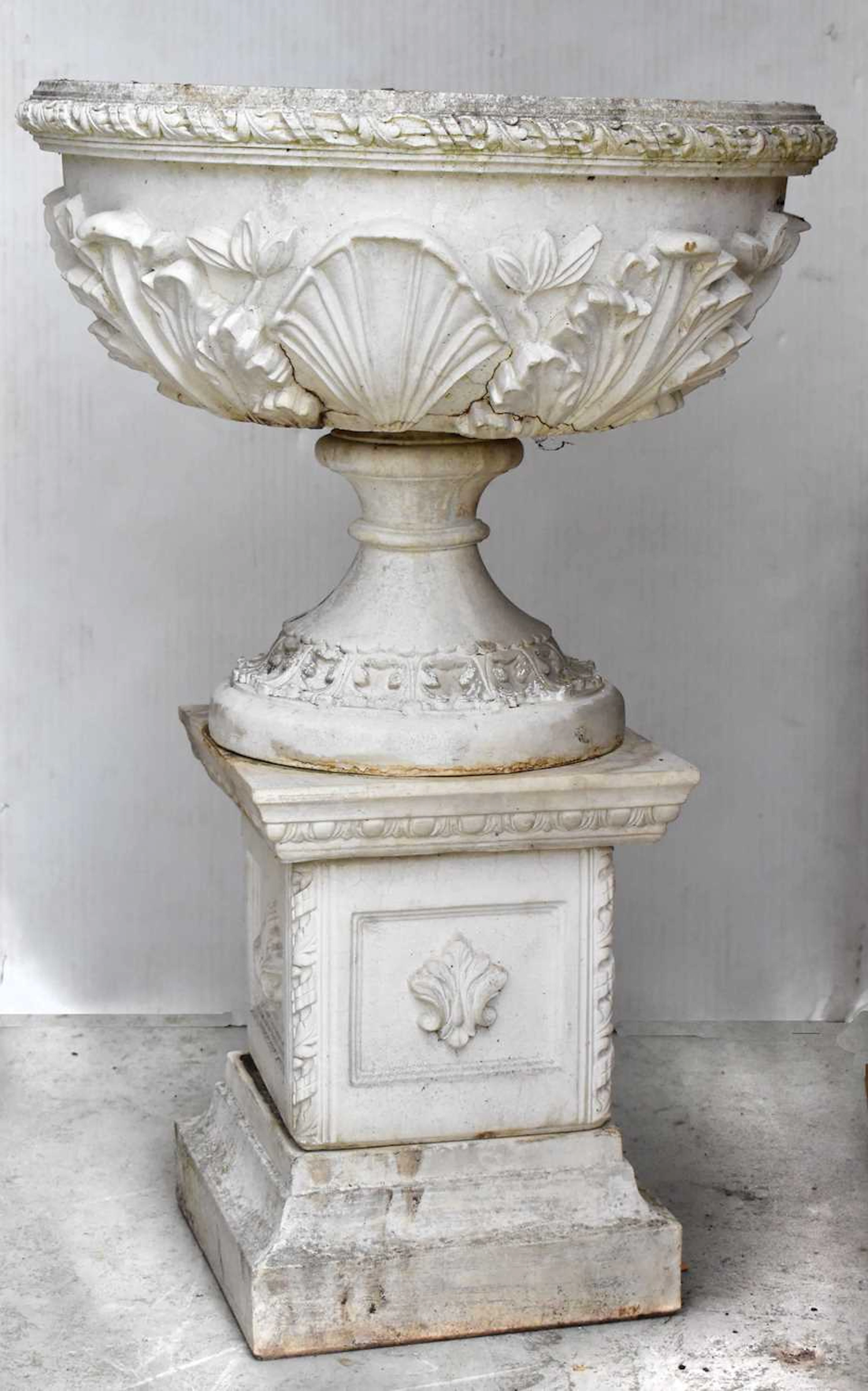 A classical style reconstituted garden urn