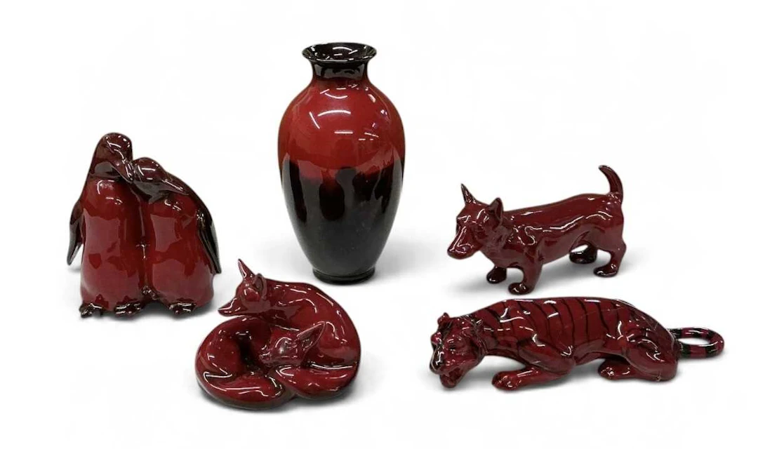 ROYAL DOULTON; five pieces of assorted flambé glazed porcelain