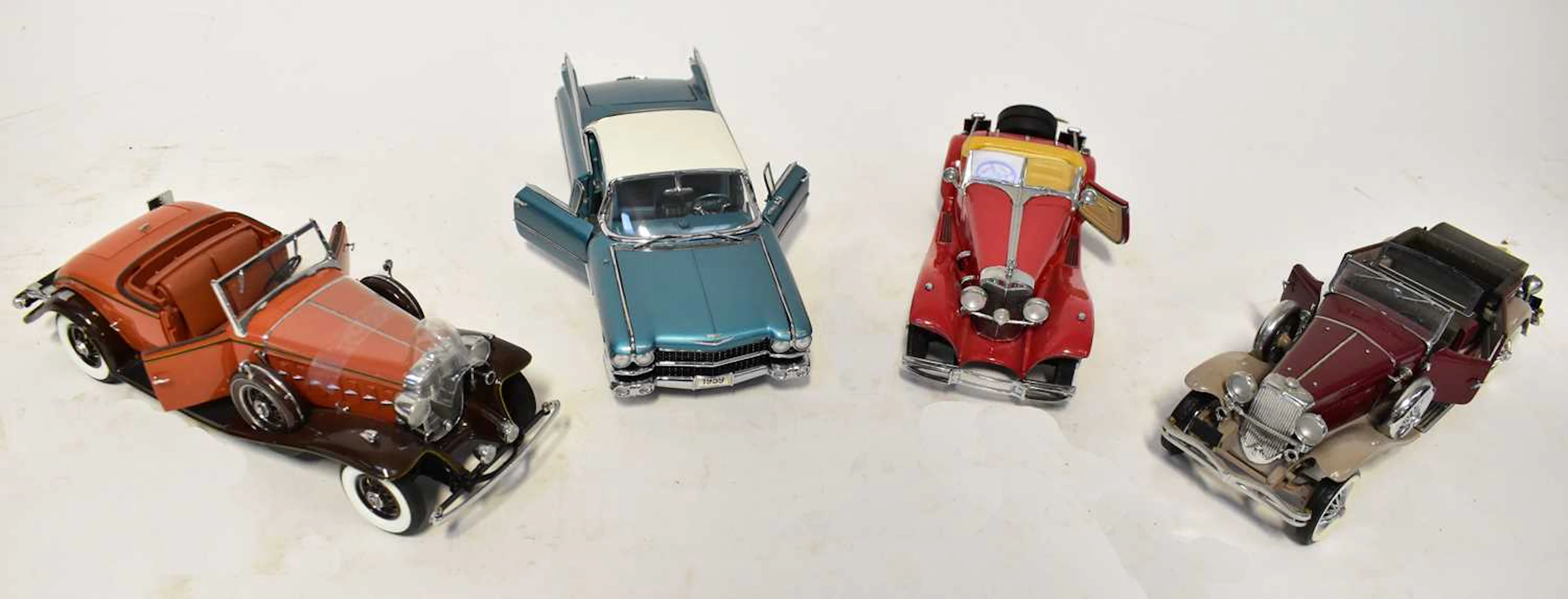 Eight Danbury Mint model cars