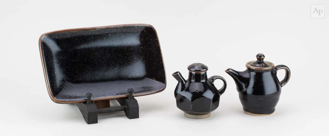 A small Japanese stoneware teapot