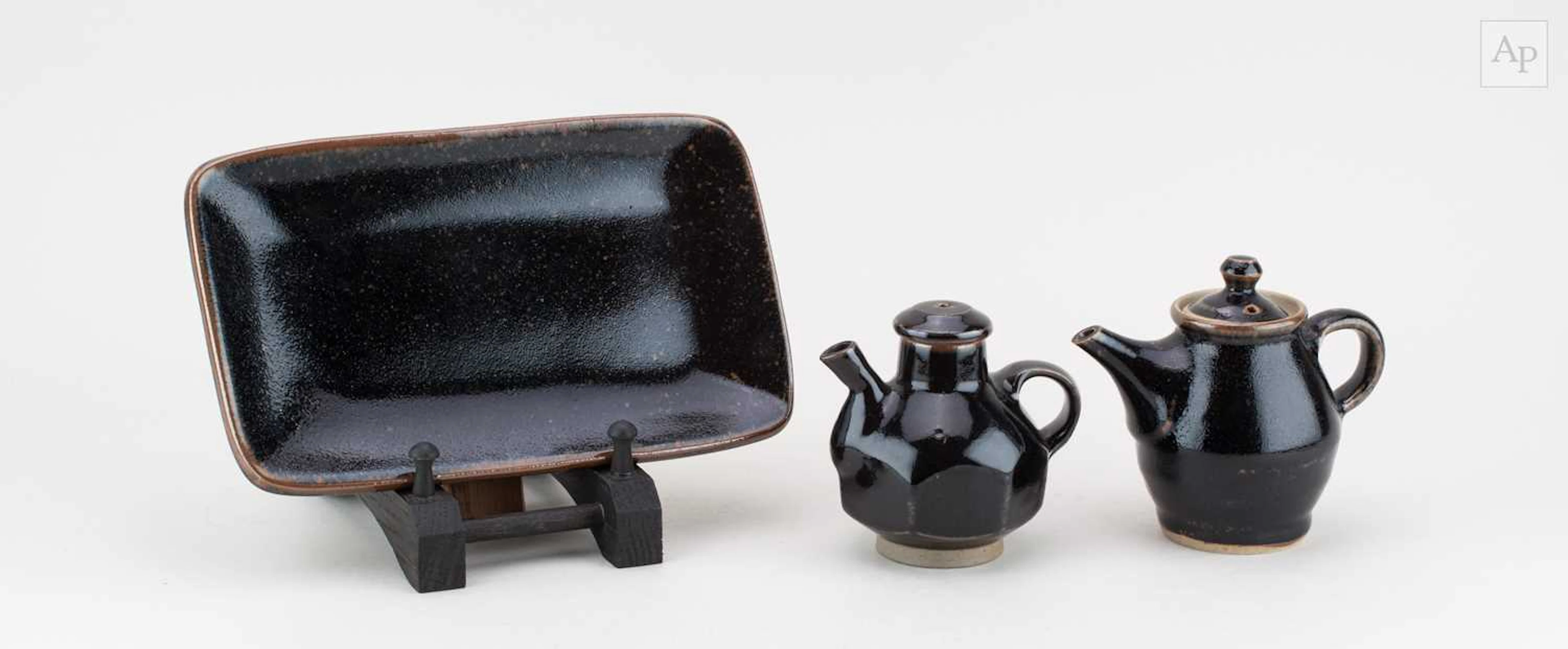 A small Japanese stoneware teapot
