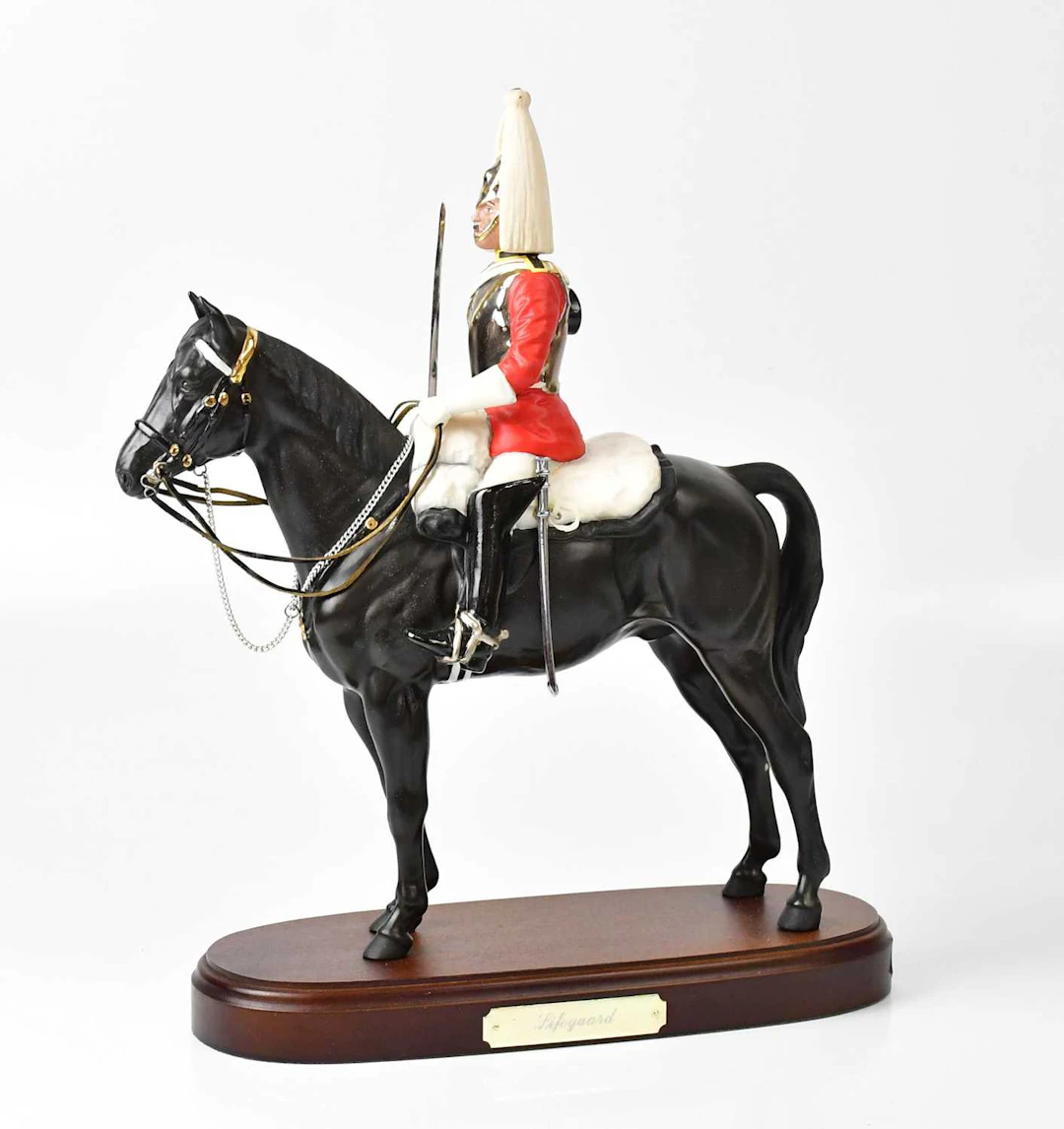 ROYAL DOULTON; a model of a mounted Royal Lifeguard by Graham Tongue