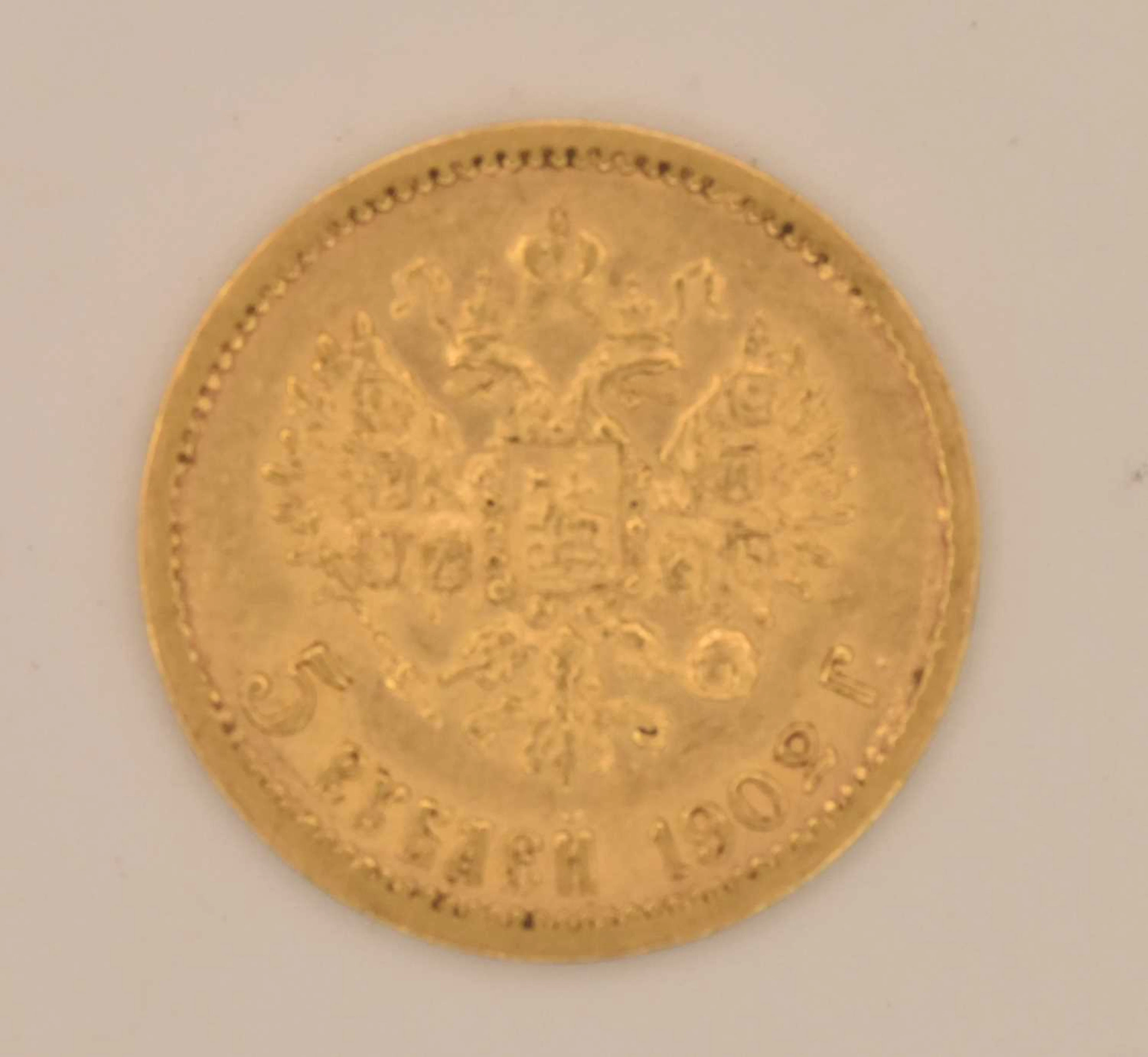 A Russian Nicholas II five rouble gold coin