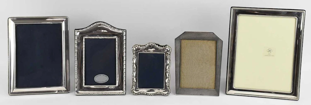 A George V Art Deco hallmarked silver easel back photograph frame