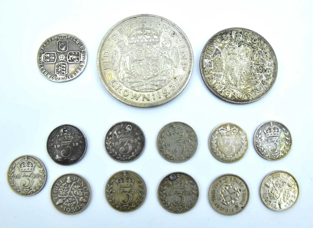 Various coins with silver and half-silver content...
