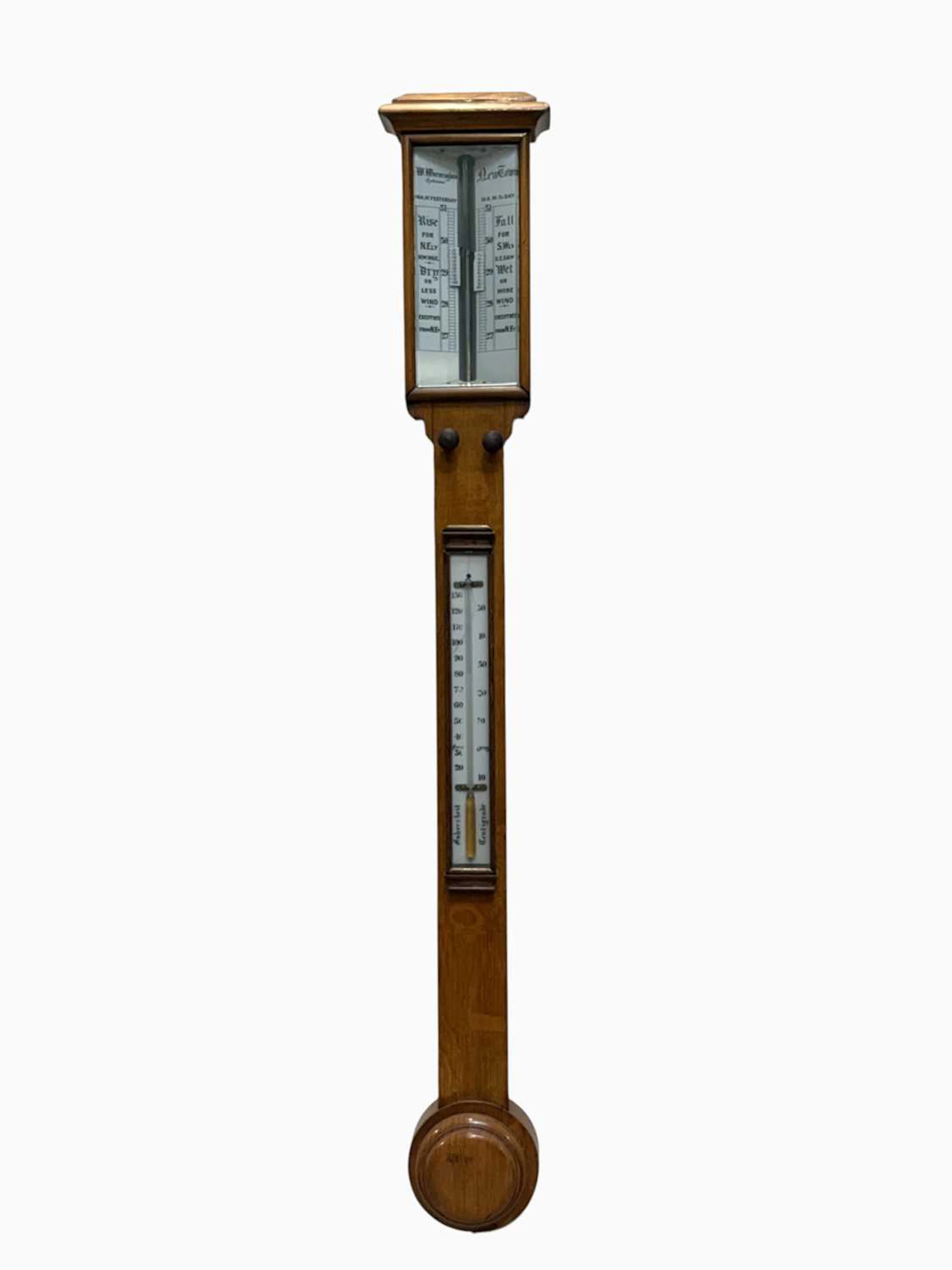 W WARMINGHAM OPTICIAN; a Victorian golden oak stick barometer