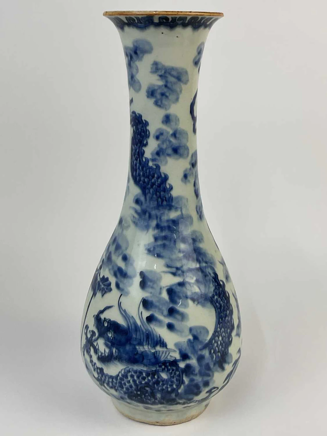 A Chinese blue and white porcelain vase decorated with a dragon