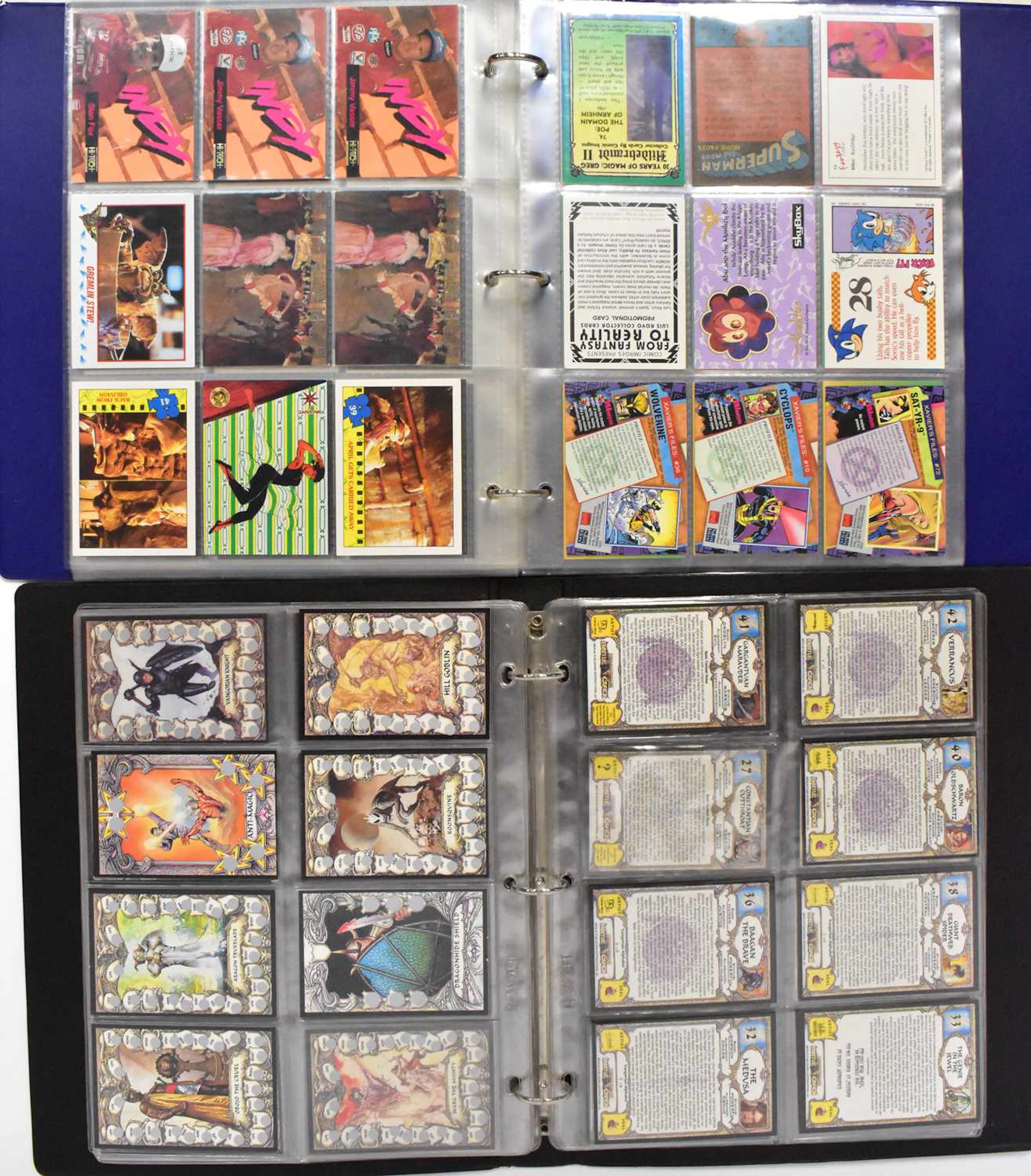 Four folders of trading cards