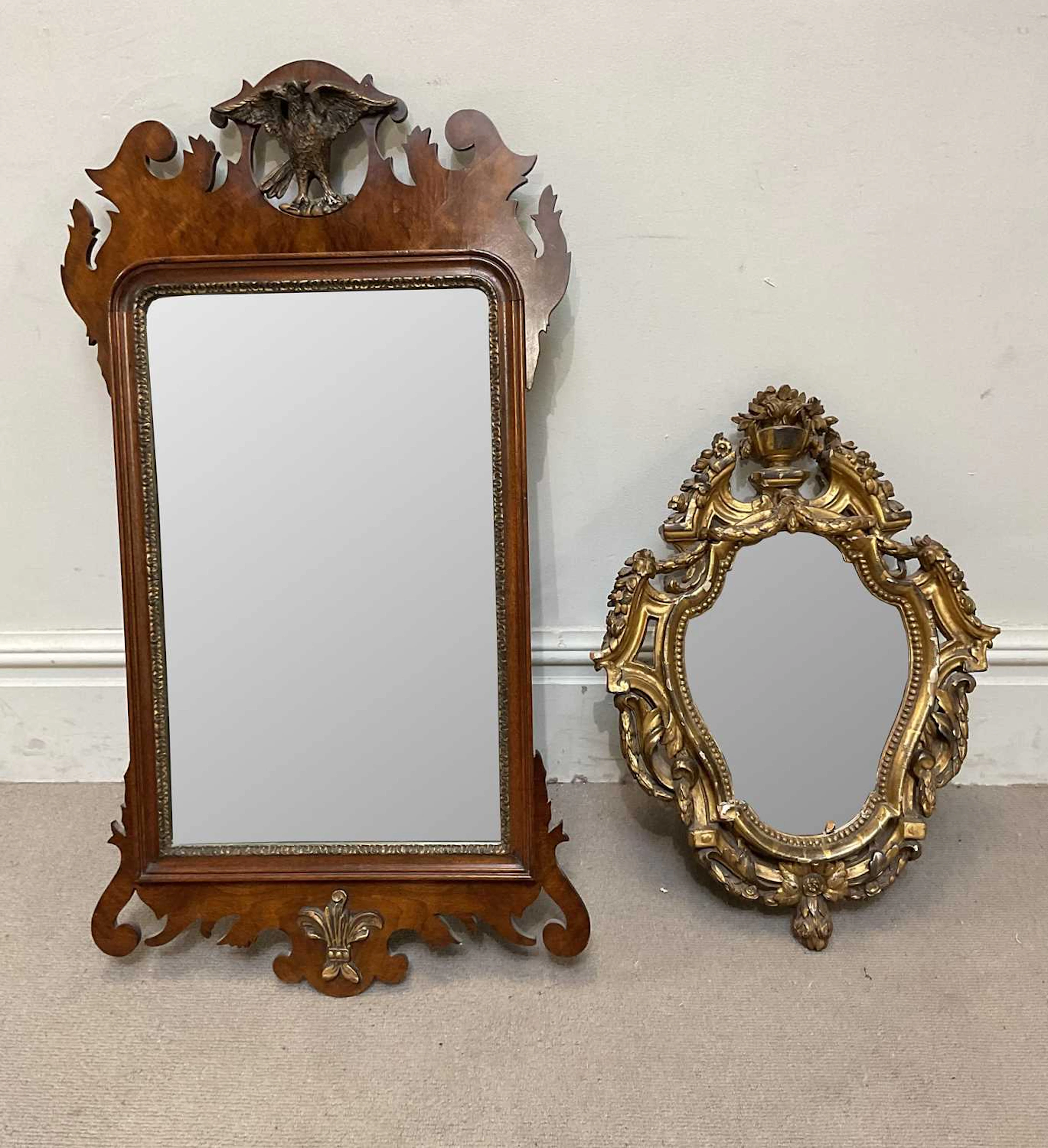 A Georgian style walnut fretwork type wall mirror