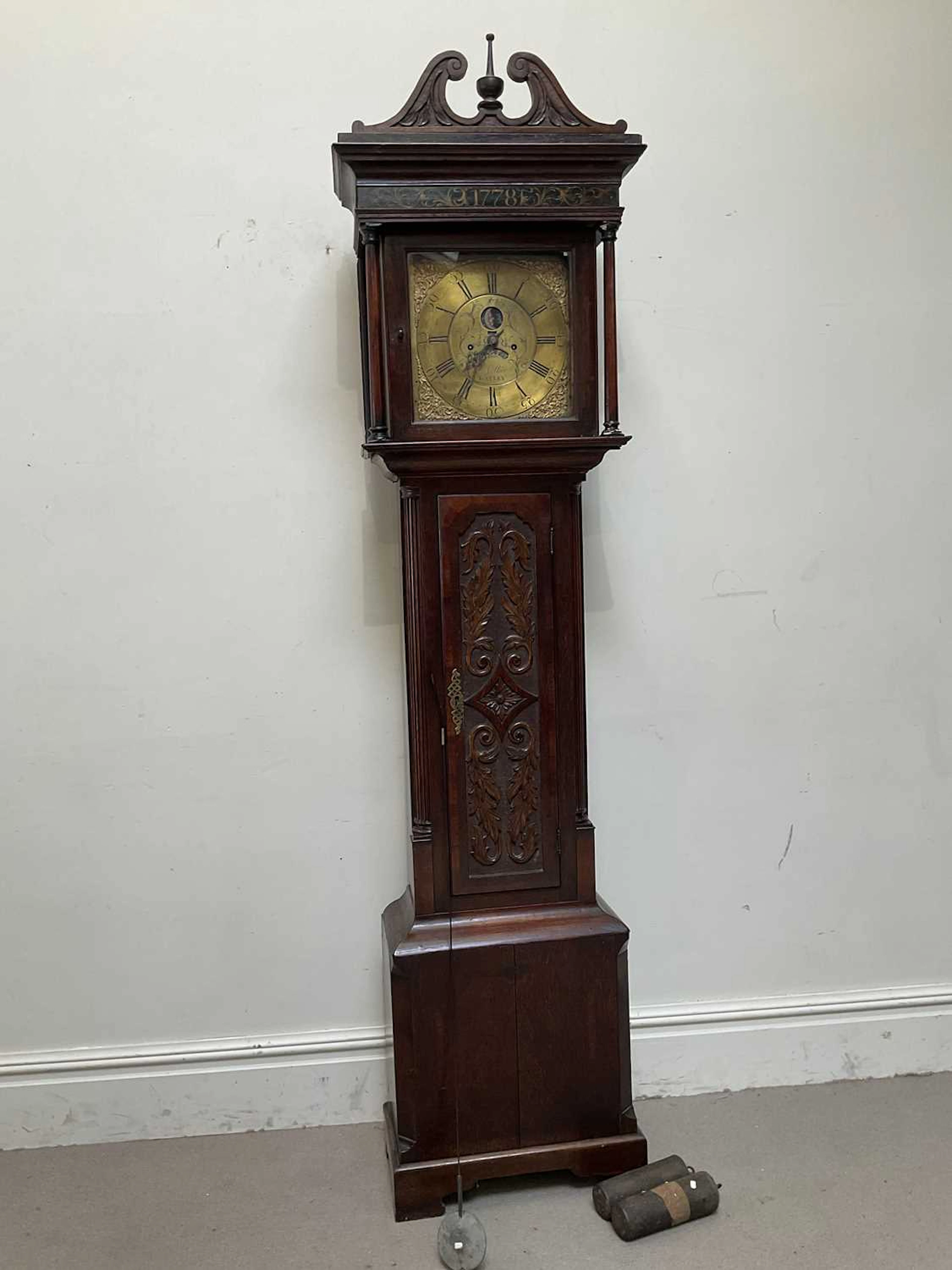 D COLLIER GATLEY; a late 18th century carved oak eight day longcase clock