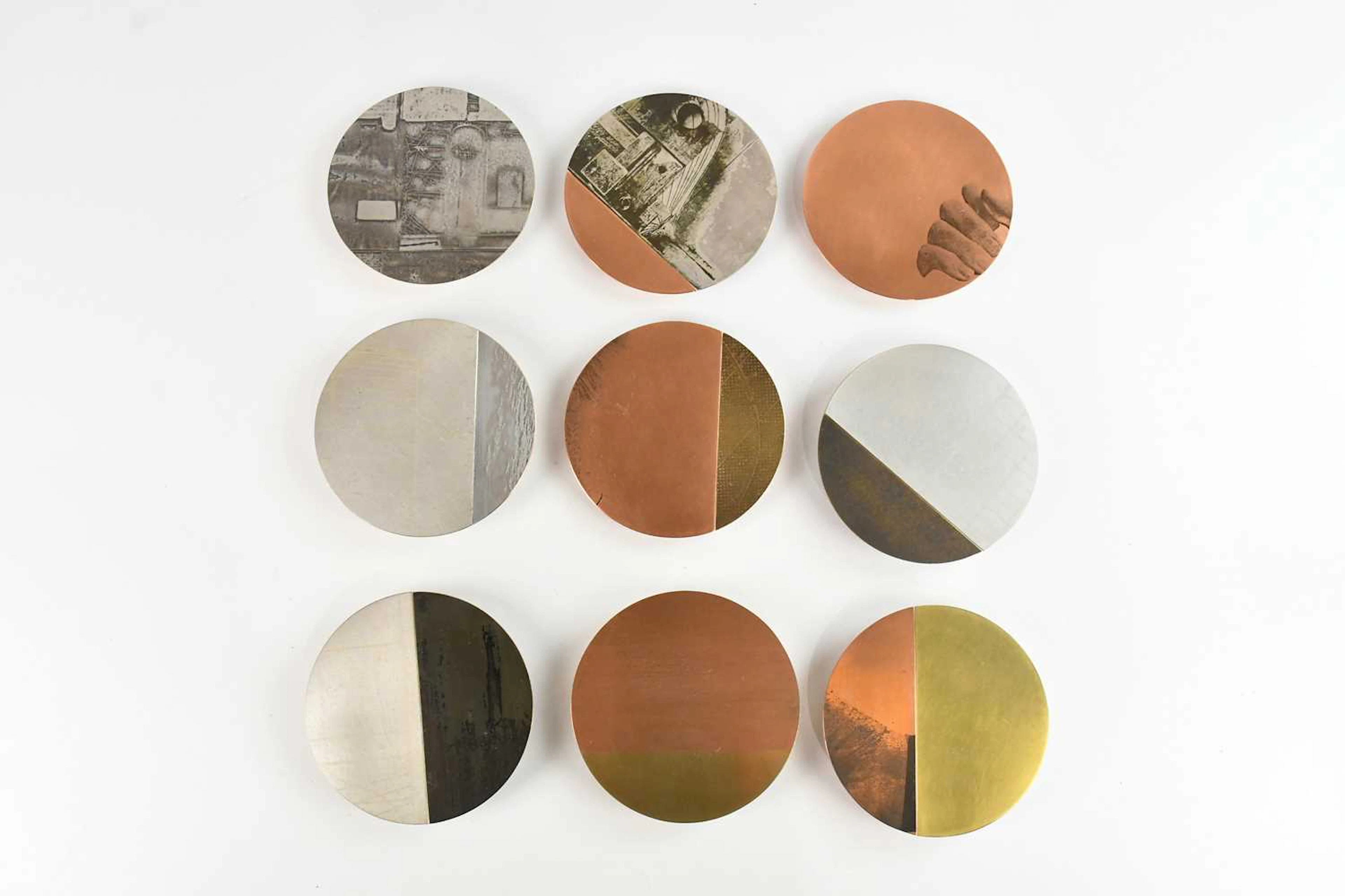 REBECCA GOULDSON; nine contemporary metal wall discs