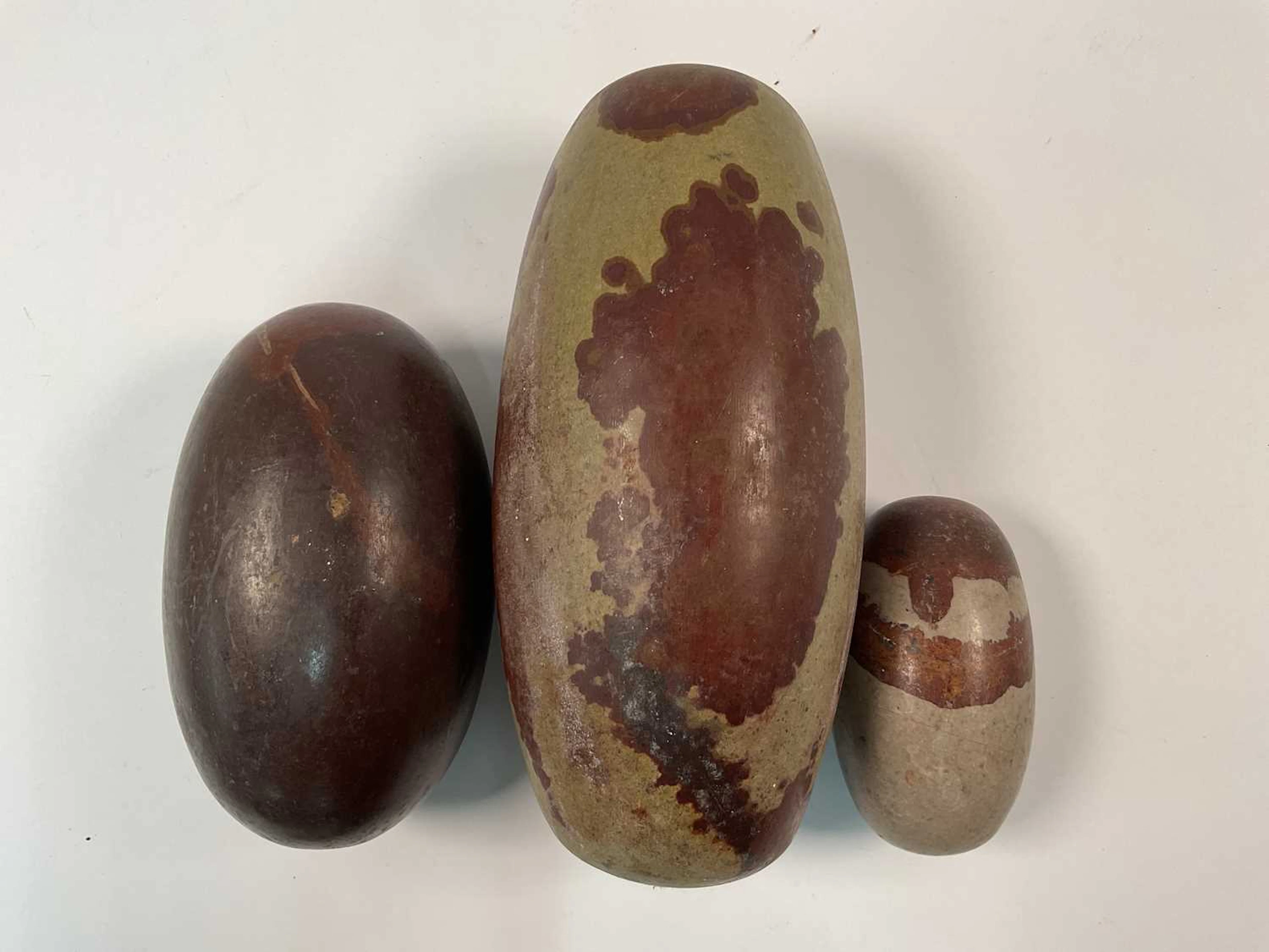 Three Shiva Lingham polished egg shaped stones from the Narmada River