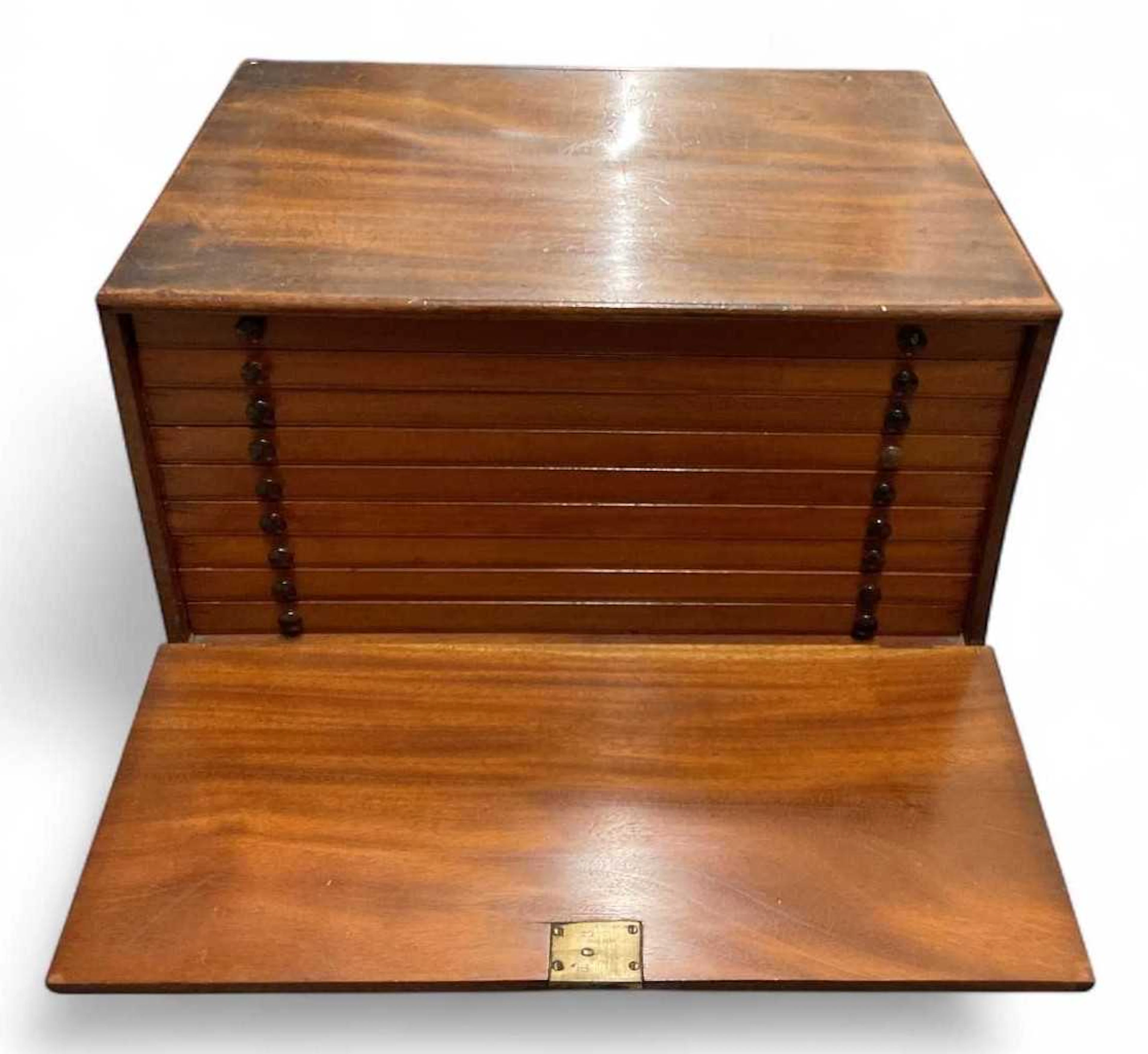 A nine drawer coin collector's chest