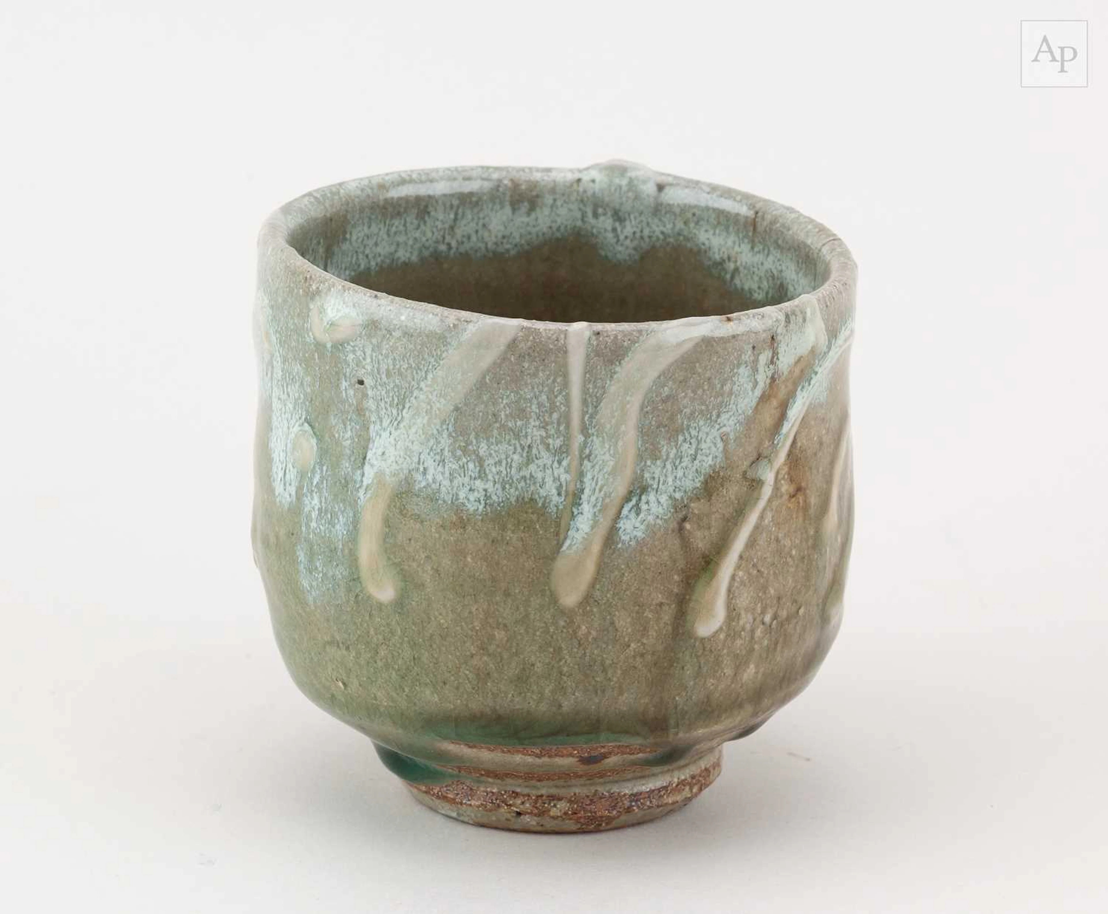TAKESHI YASUDA (born 1943); a stoneware yunomi covered in...