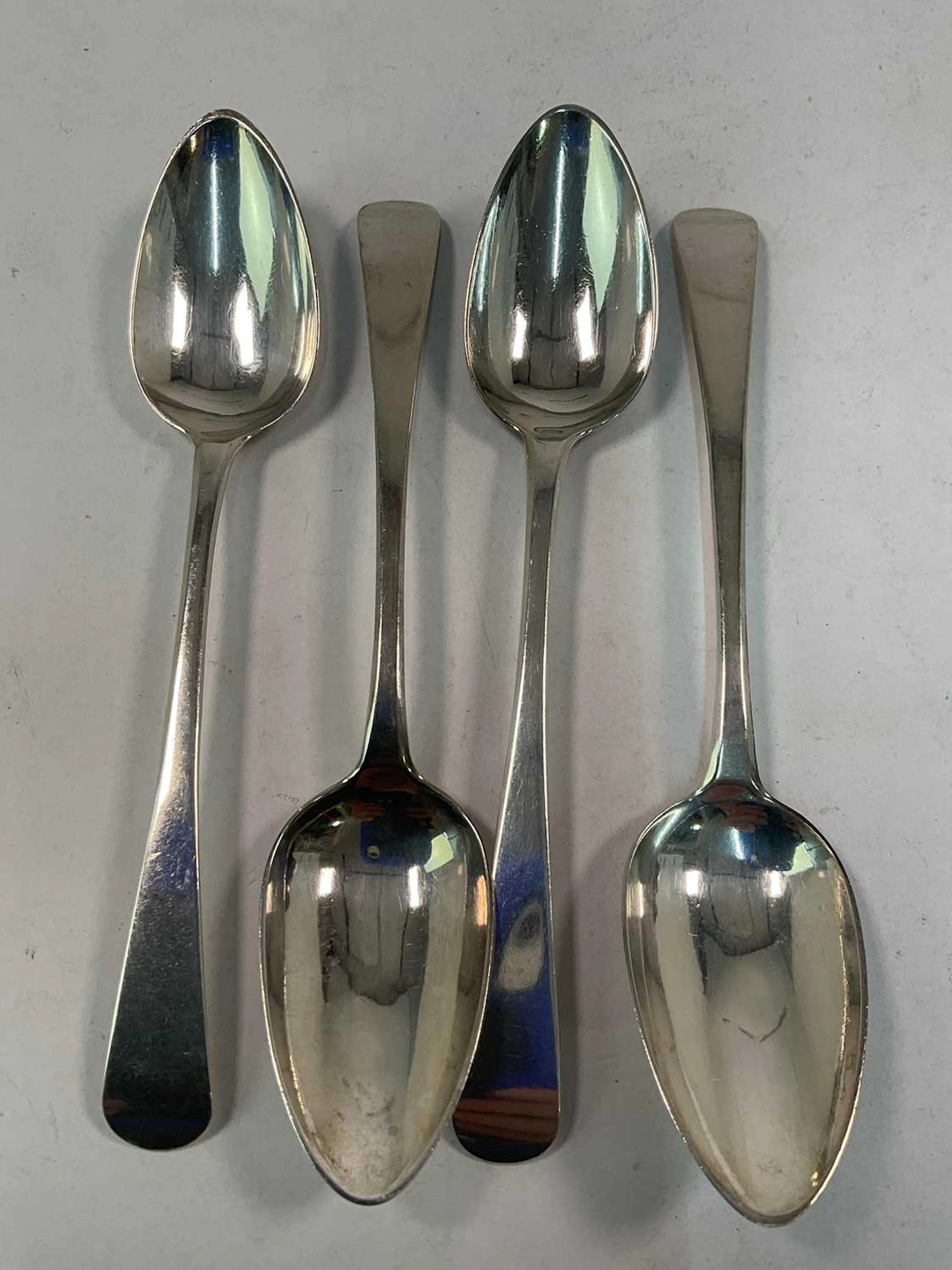 ALEXANDER HENDERSON; a set of four George III hallmarked silver spoons