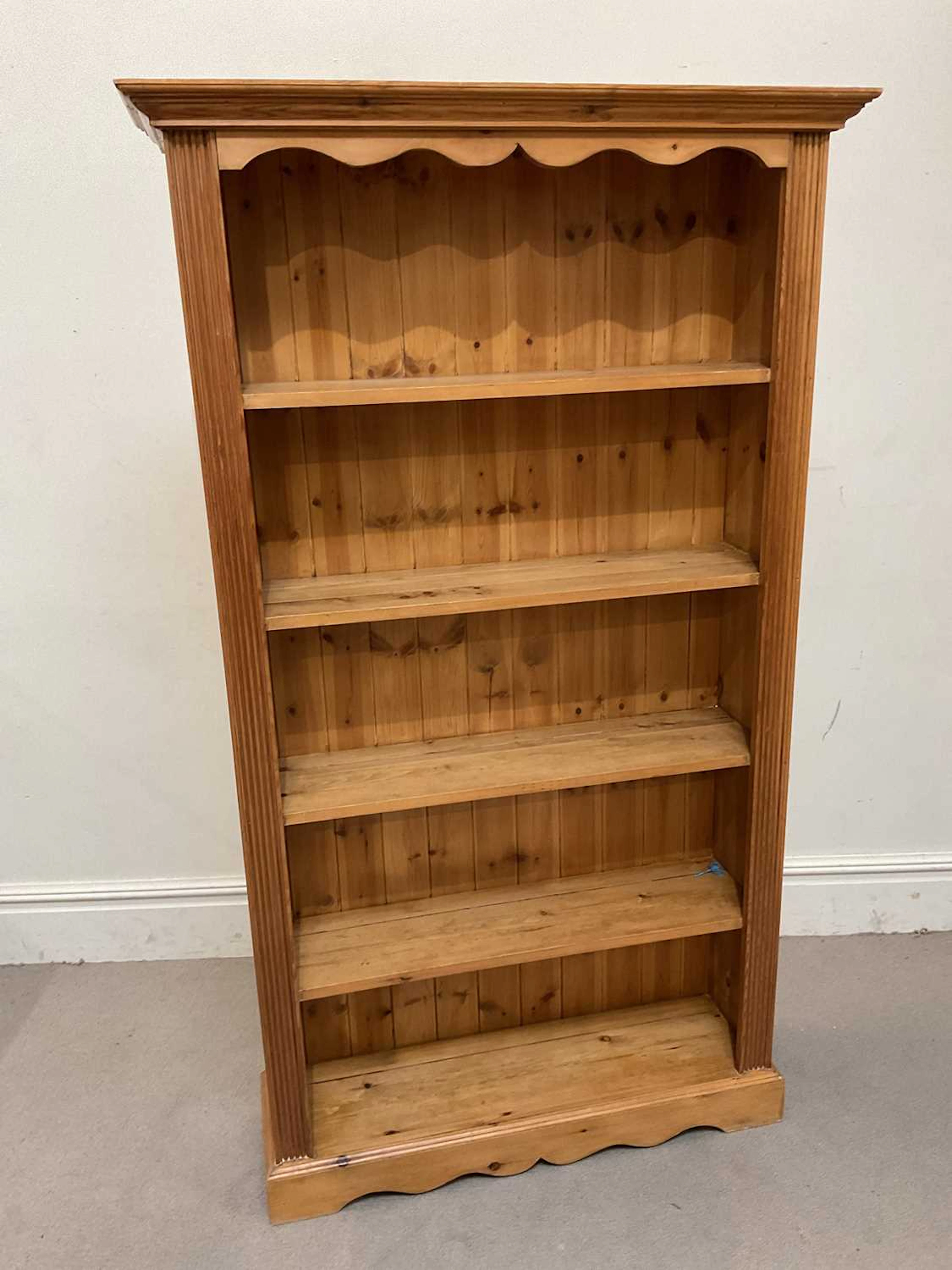 A modern pine open bookcase
