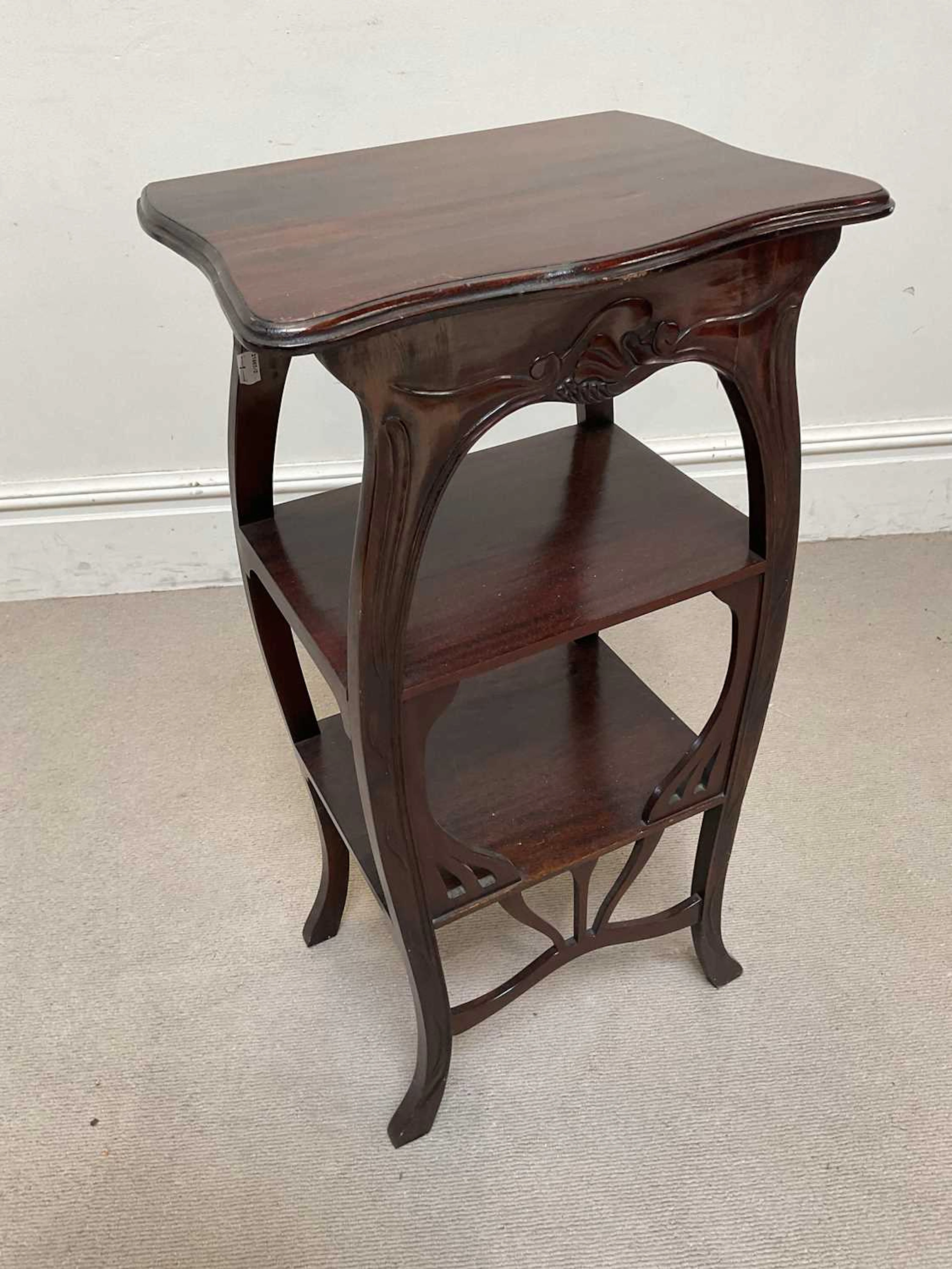 A reproduction Art Nouveau style three tier jardinere stand