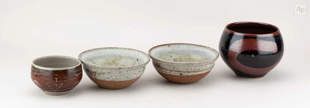 ANDREW CROUCH (born 1955); a stoneware bowl covered in...