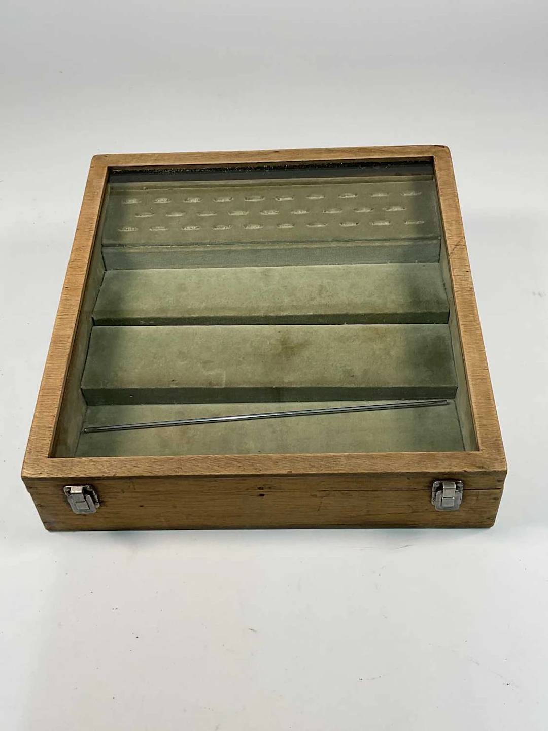 An oak framed jewellery display case