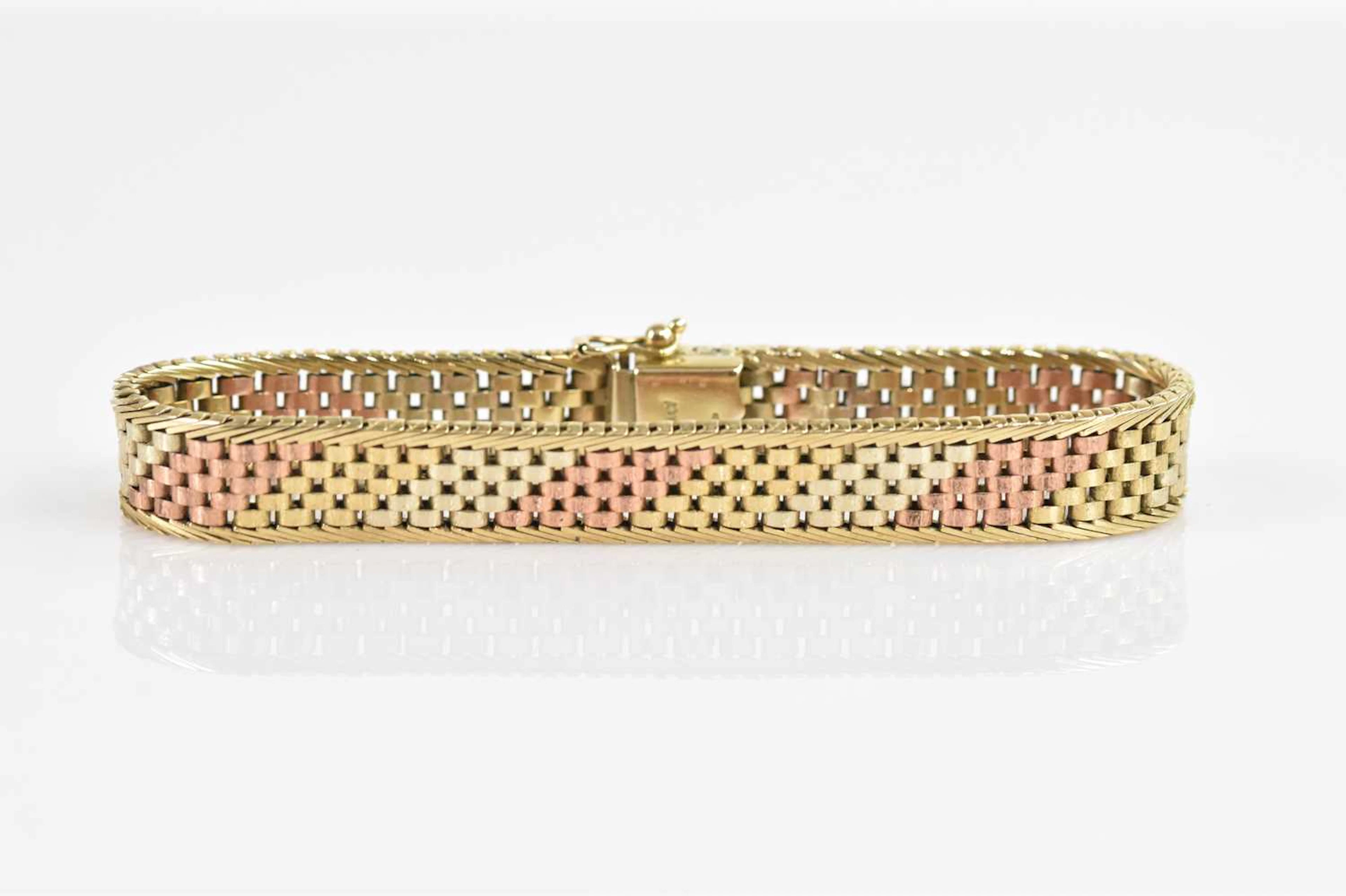 An Italian yellow metal tri-coloured bracelet